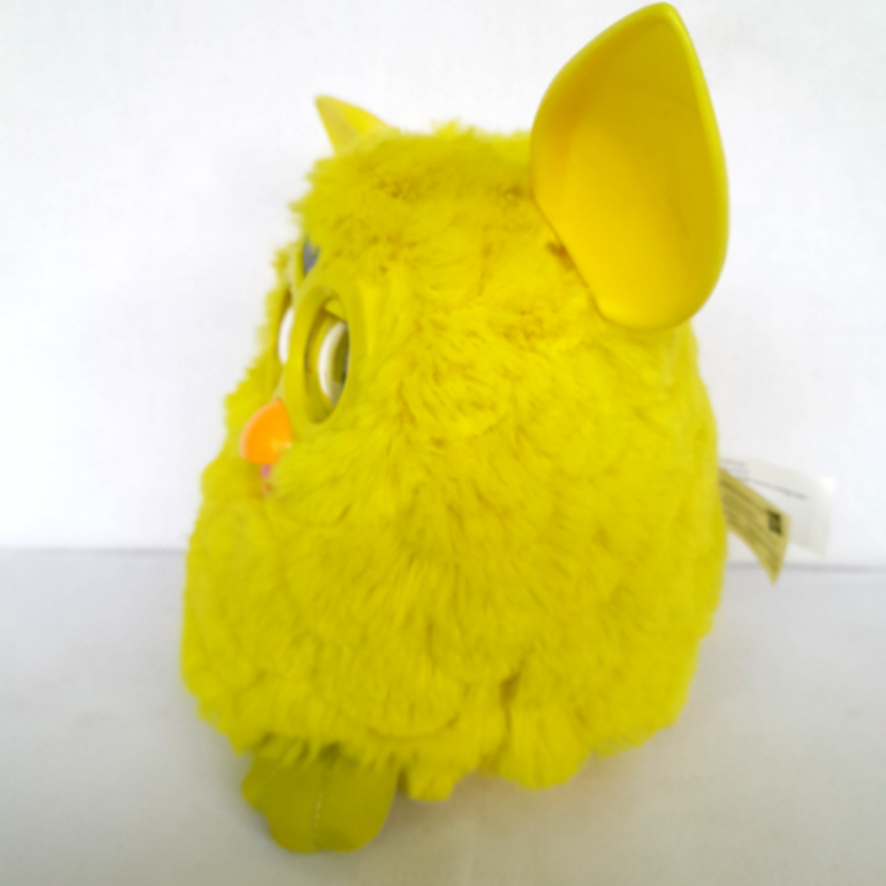 Voir photo 3 de PELUCHE Intercative jaune FURBY Hasbro 2012 PELUCHE Intercative jaune FURBY Hasbro 2012 Bon état reconditionné photo 3