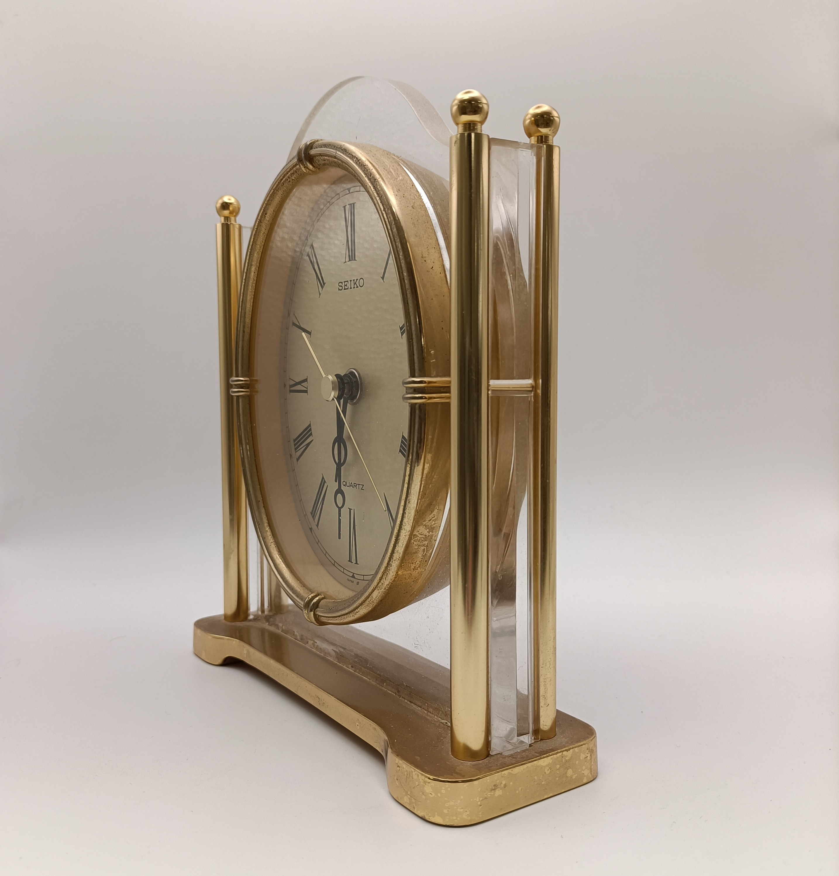 Voir photo 2 de Pendule Seiko vintage en métal doré – horloge de table design rétro chic Pendule Seiko vintage en métal doré – horloge de table design rétro chic Très bon état reconditionné photo 2