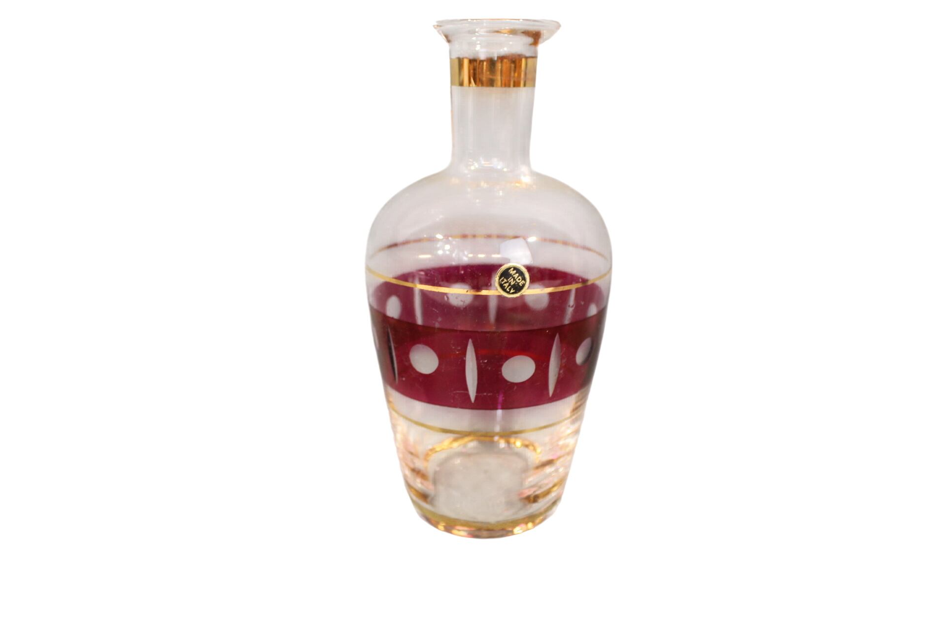 Petite carafe en verre avec relief et bordures dorées. État correct - 10,00 € Petite carafe en verre avec relief et bordures dorées. État correct reconditionné disponible sur Label Emmaüs