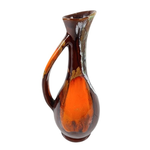 Acheter Pichet en céramique "Vallauris" marron et orange Très bon état - 50,00 € Pichet en céramique "Vallauris" marron et orange Très bon état reconditionné disponible sur Label Emmaüs
