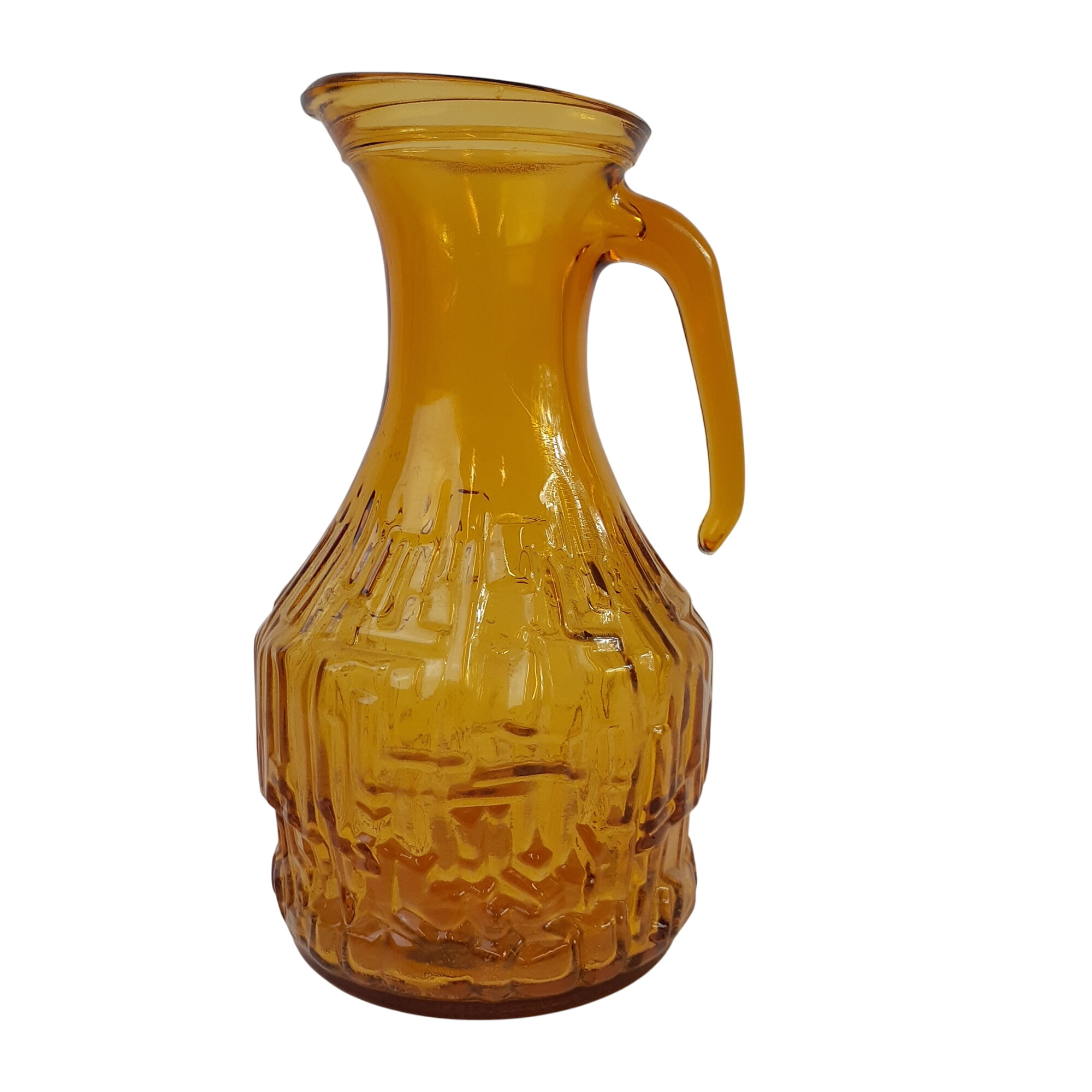 Pichet en verre ambre des années 70 Parfait état - 12,00 € Pichet en verre ambre des années 70 Parfait état reconditionné disponible sur Label Emmaüs