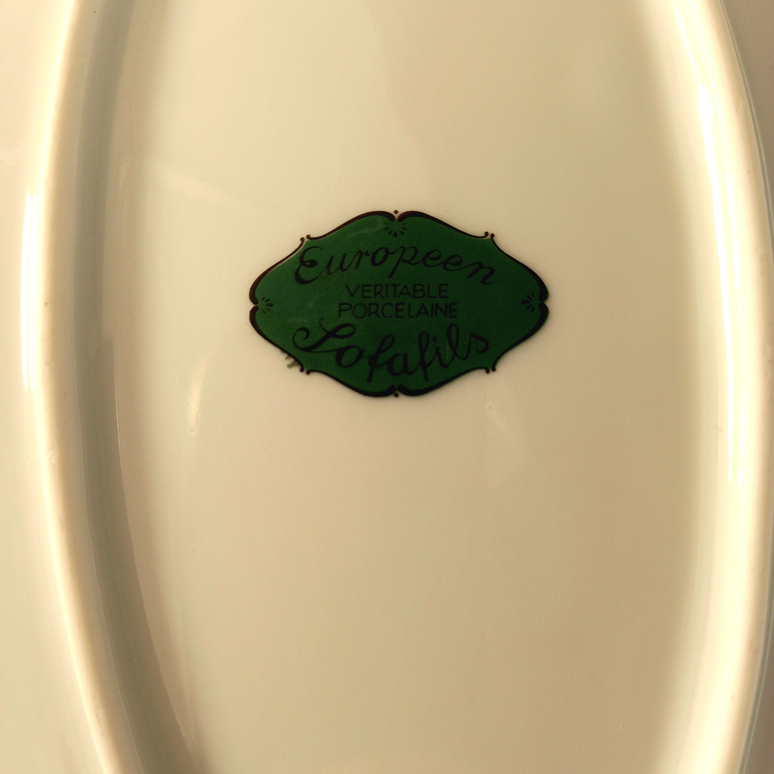 Voir photo 4 de Plat de service ovale en porcelaine de Limoges, manufacture Sofafils, motif "brochet" Plat de service ovale en porcelaine de Limoges, manufacture Sofafils, motif "brochet" Très bon état reconditionné photo 4