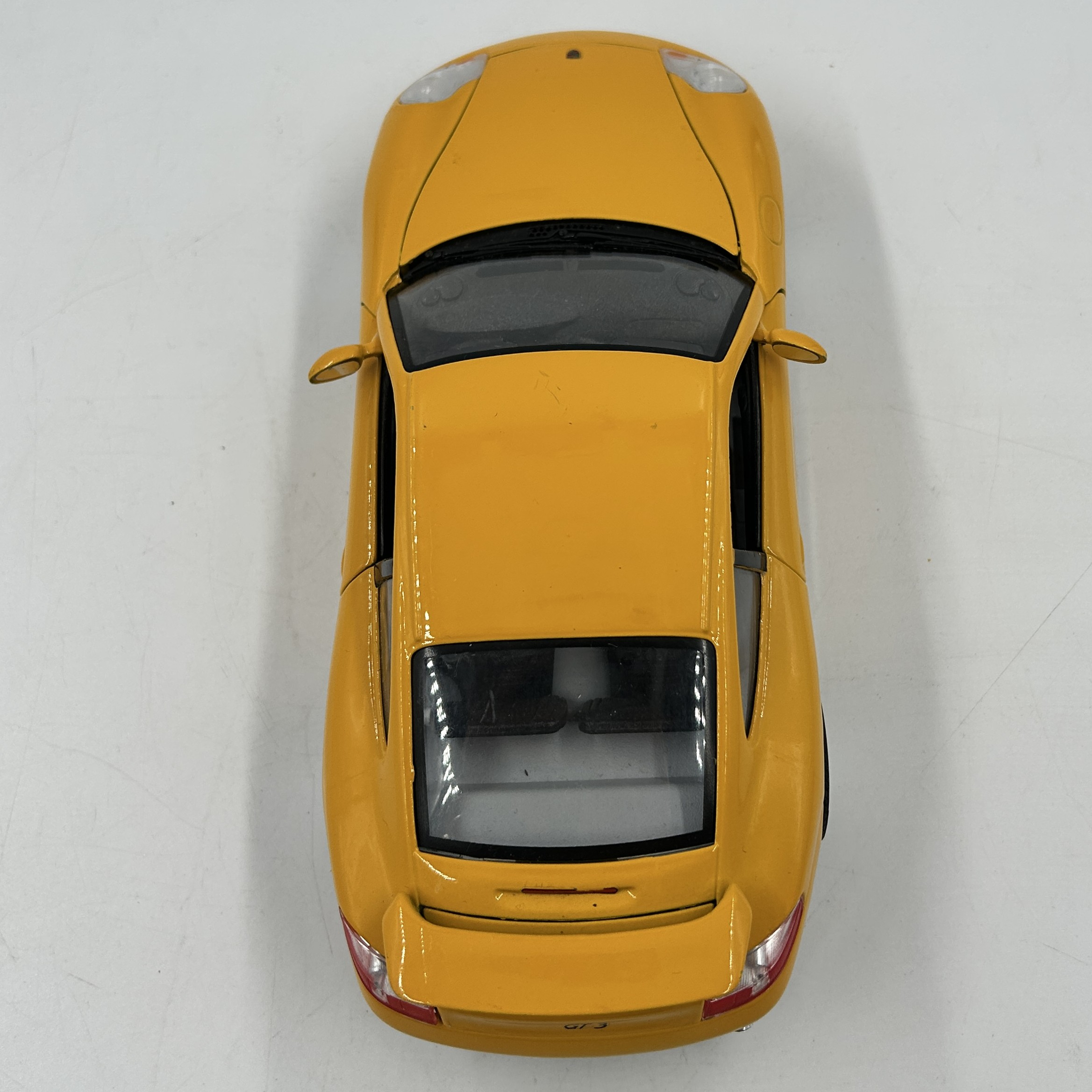 Voir photo 6 de Porsche Carrera 911 jaune Burago 1/18 Porsche Carrera 911 jaune Burago 1/18 Bon état reconditionné photo 6