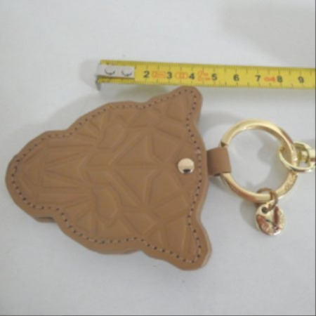 Voir photo 3 de Porte-clés à tête de léopard Marc Cain Porte-clés à tête de léopard Marc Cain Très bon état reconditionné photo 3