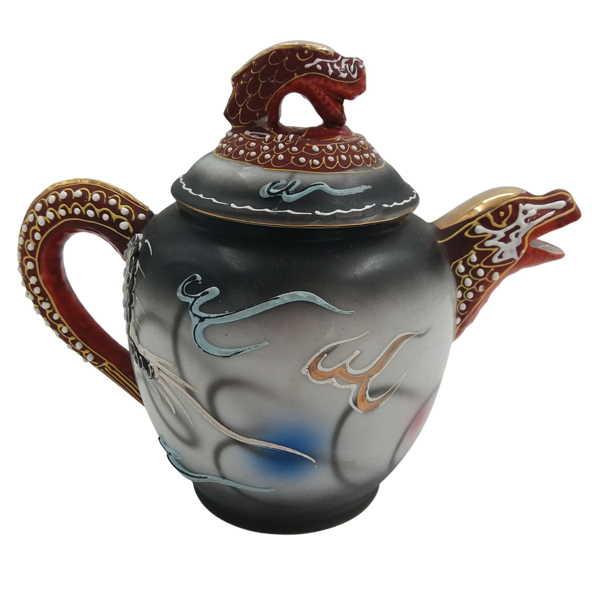 Pot à lait en porcelaine. Indonésien. Couleur gris. Motif dragon. Très bon état - 12,00 € Pot à lait en porcelaine. Indonésien. Couleur gris. Motif dragon. Très bon état reconditionné disponible sur Label Emmaüs