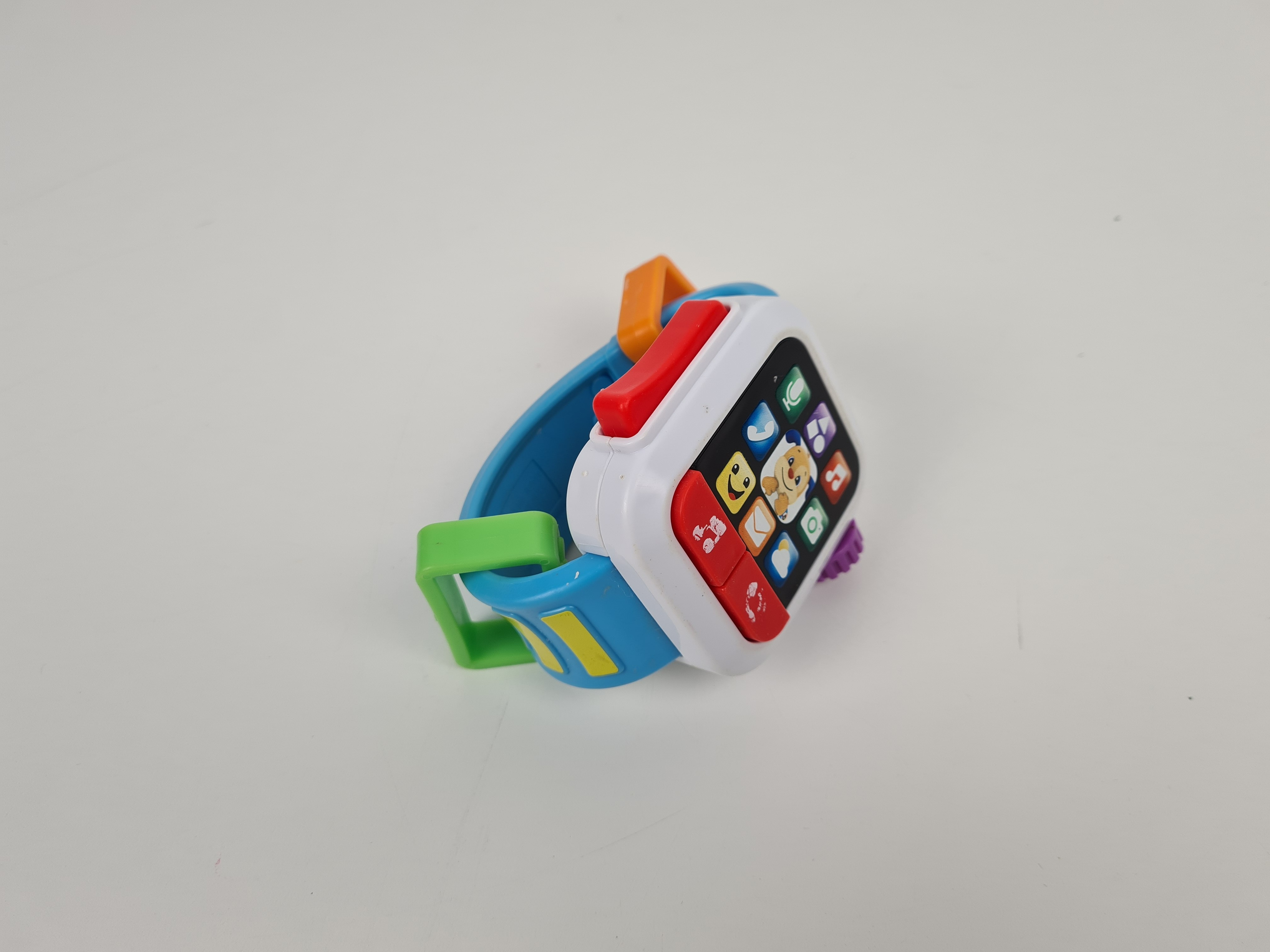 Voir photo 2 de Premier âge - Montre connectée jouet musical pour bébé, multicolore - Fisher price - 6 mois + Premier âge - Montre connectée jouet musical pour bébé, multicolore - Fisher price - 6 mois + Bon état reconditionné photo 2