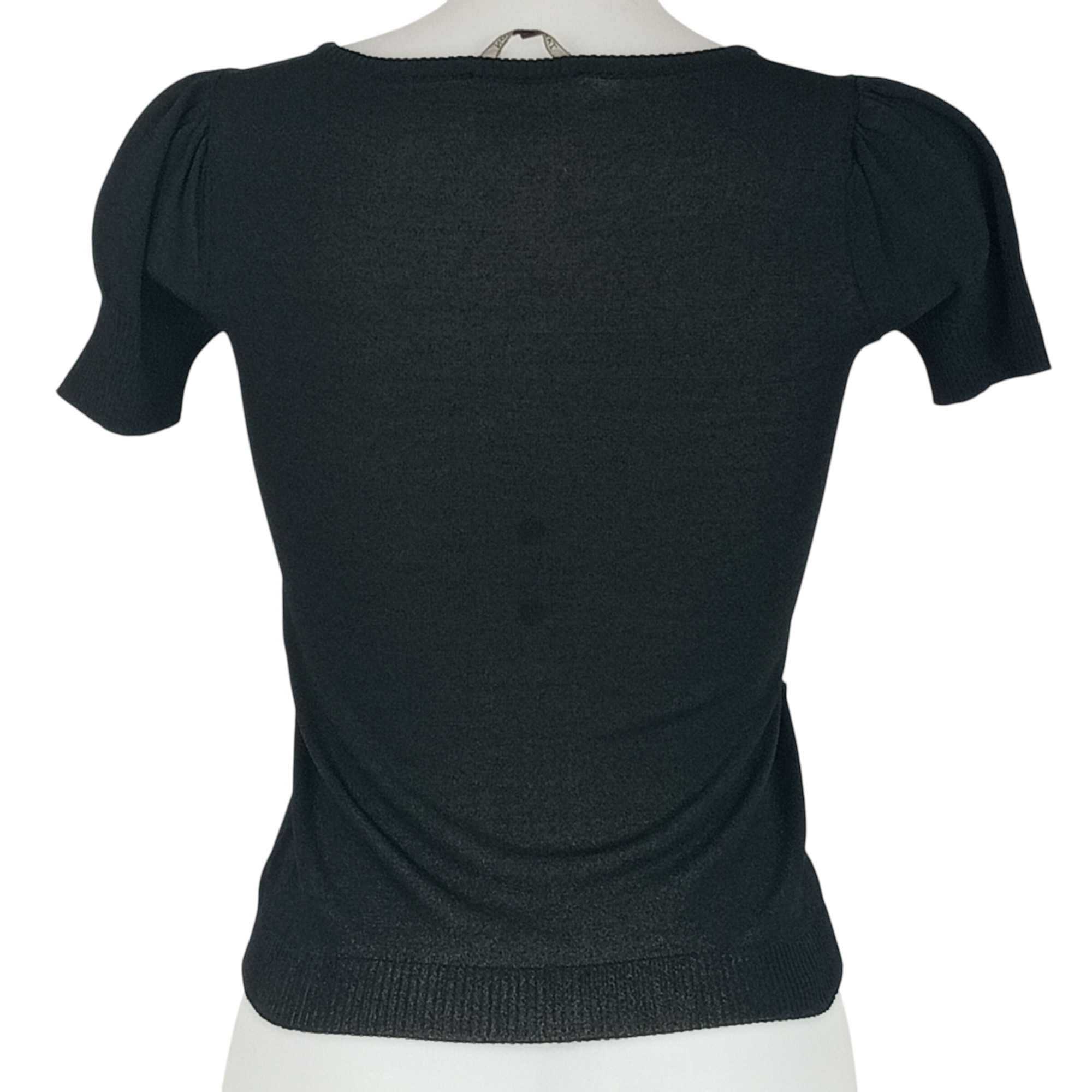 Voir photo 2 de Pull - femme - marque Tara Jarmon - manches courtes - couleur noir - taille M (38) Pull - femme - marque Tara Jarmon - manches courtes - couleur noir - taille M (38) Très bon état reconditionné photo 2