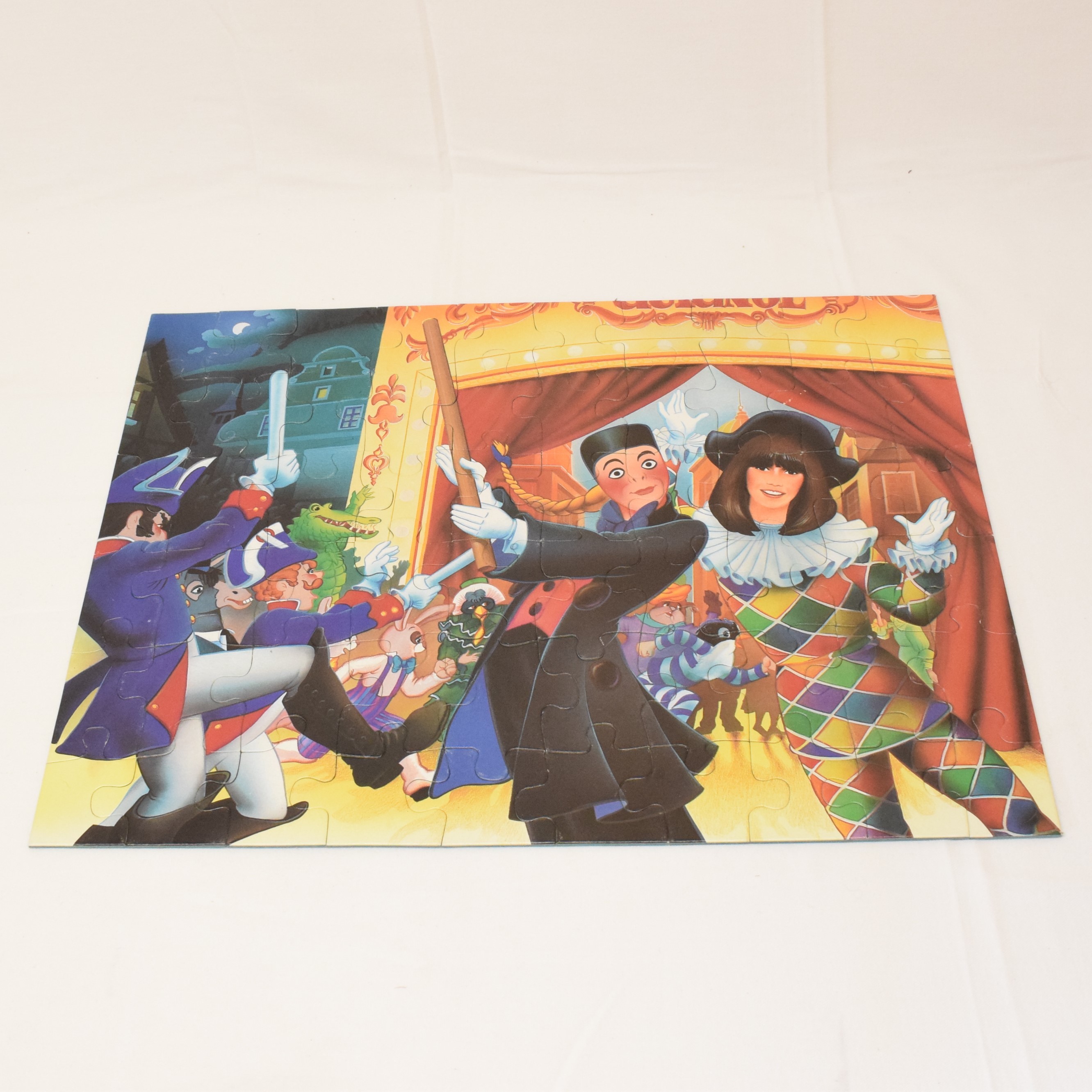 Voir photo 3 de Puzzle 60 pièces Chantal Goya C'est Guignol jeux Nathan 1982 Puzzle 60 pièces Chantal Goya C'est Guignol jeux Nathan 1982 État correct reconditionné photo 3