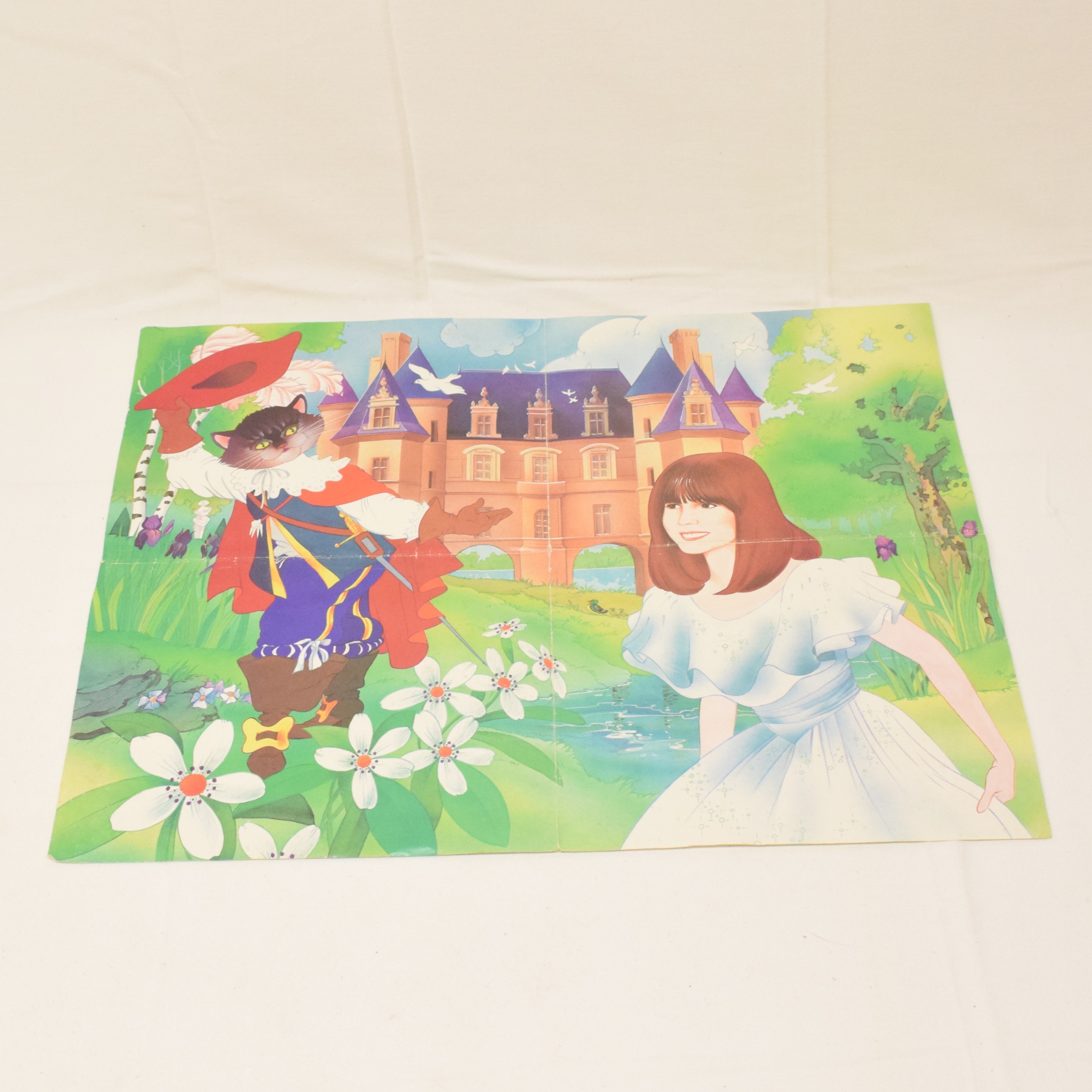 Voir photo 5 de Puzzle 60 pièces Chantal Goya le chat botté jeux Nathan 1983 Puzzle 60 pièces Chantal Goya le chat botté jeux Nathan 1983 État correct reconditionné photo 5