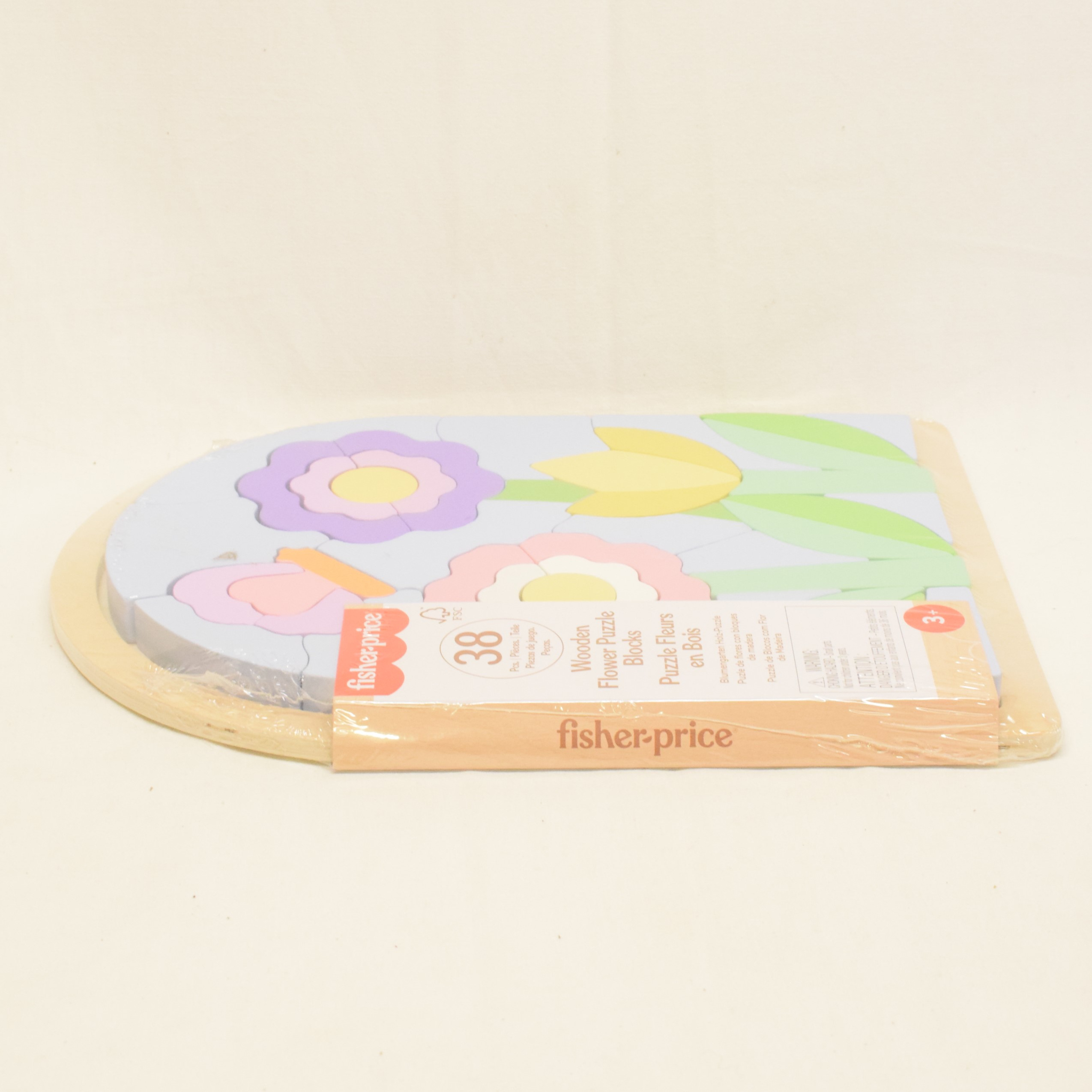 Voir photo 2 de Puzzle fleurs en bois 38 pièces par Fisher Price Puzzle fleurs en bois 38 pièces par Fisher Price Parfait état reconditionné photo 2