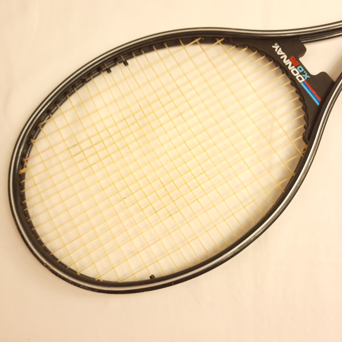 Voir photo 4 de RAQUETTE de tennis "Donnay" D25 avec une housse Dunlop. RAQUETTE de tennis "Donnay" D25 avec une housse Dunlop. Bon état reconditionné photo 4