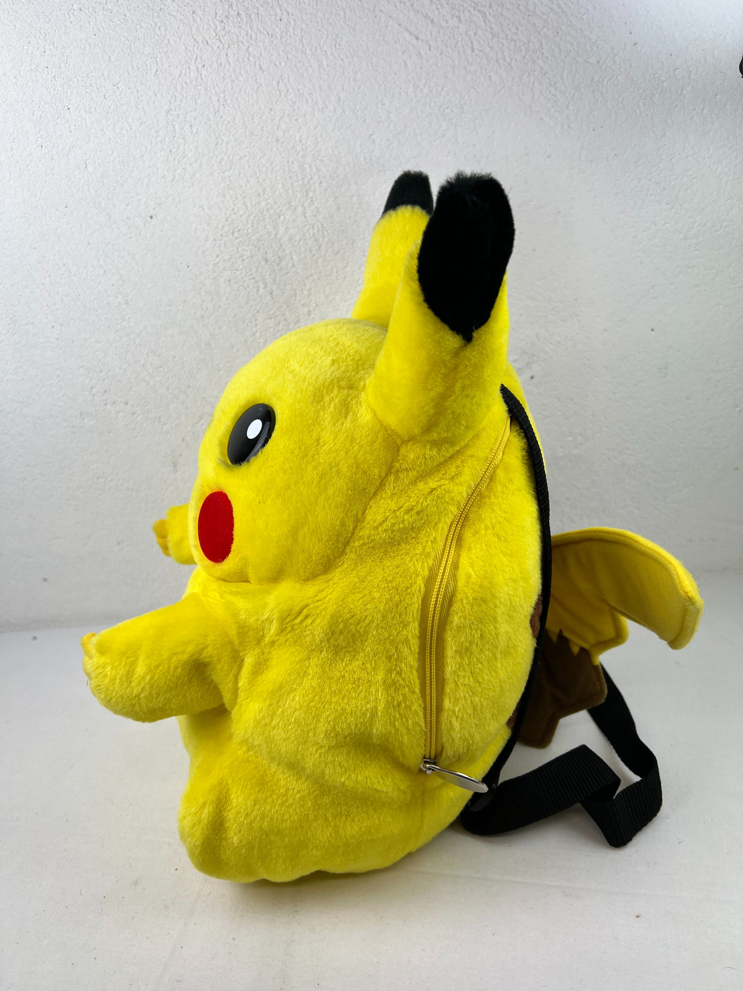 Voir photo 3 de Sac à dos Pikachu Tomy Sac à dos Pikachu Tomy Très bon état reconditionné photo 3