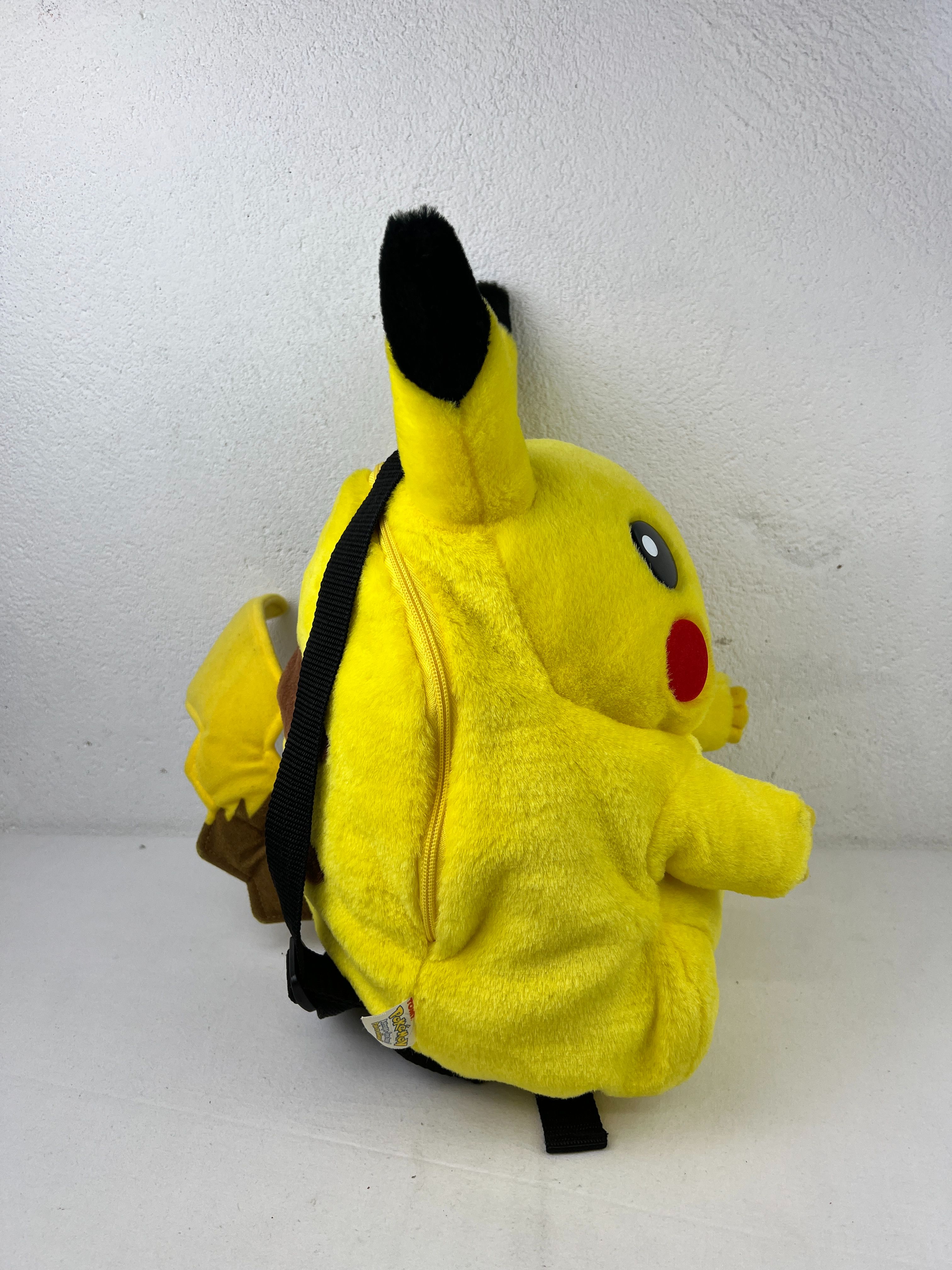Voir photo 4 de Sac à dos Pikachu Tomy Sac à dos Pikachu Tomy Très bon état reconditionné photo 4