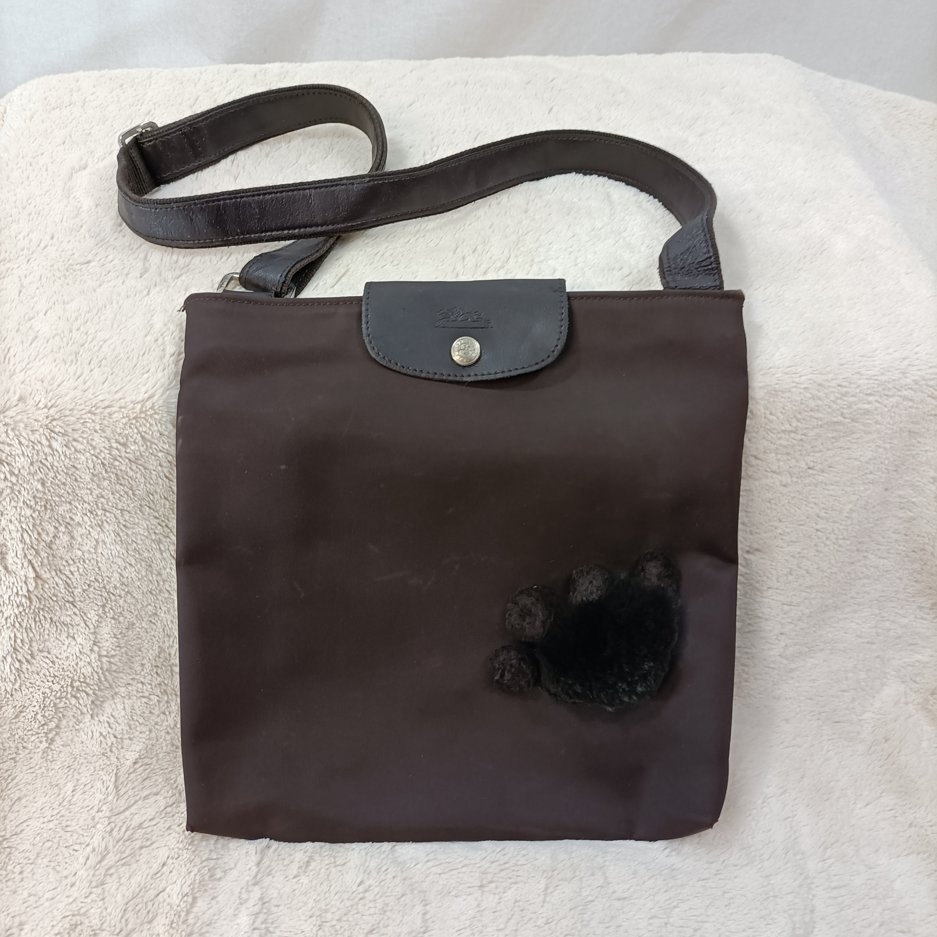 Sac bandoulière en toile et cuir - Longchamp État correct - 41,30 € Sac bandoulière en toile et cuir - Longchamp État correct reconditionné disponible sur Label Emmaüs