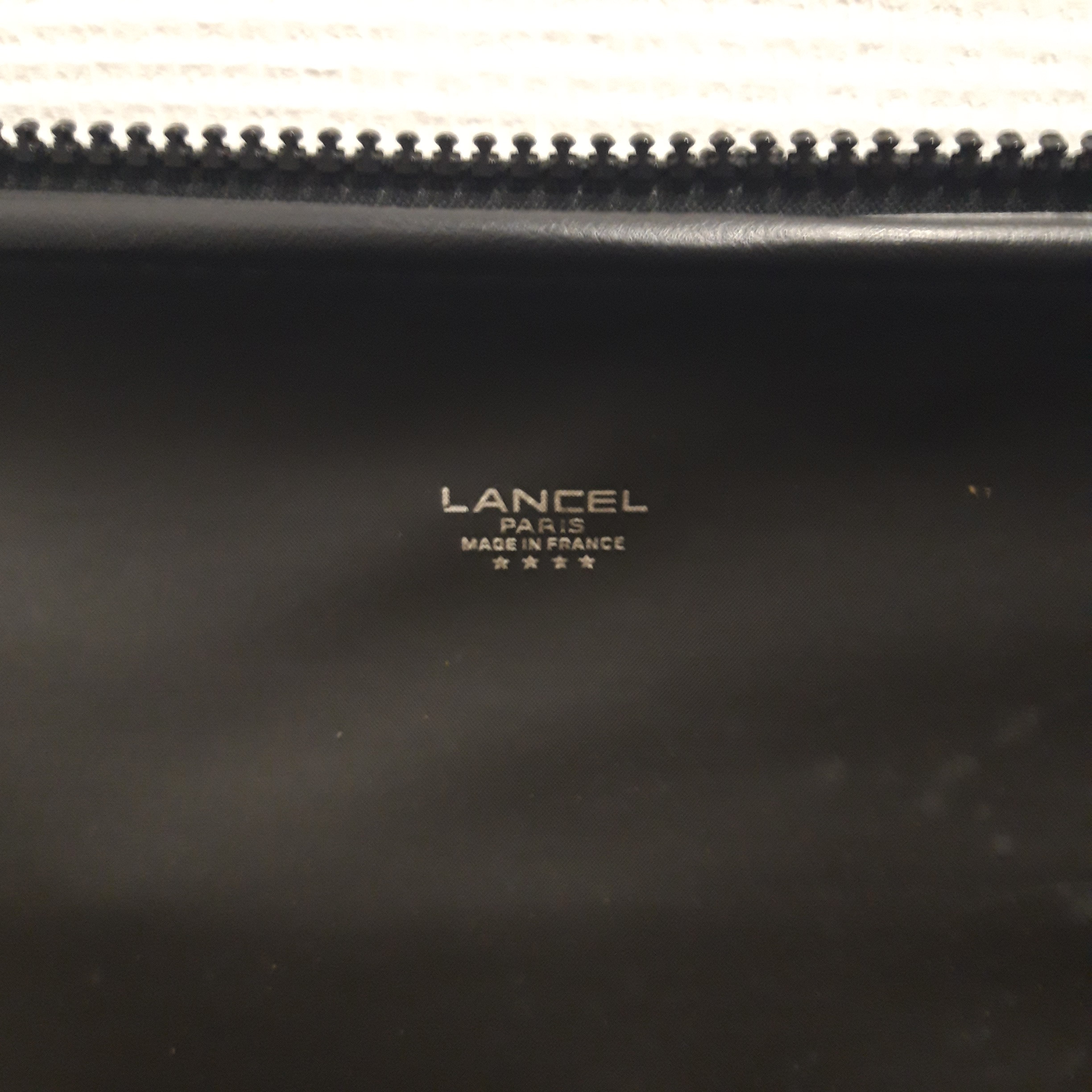 Voir photo 3 de Sac de voyage Lancel vintage – couleur noire Sac de voyage Lancel vintage – couleur noire Bon état reconditionné photo 3
