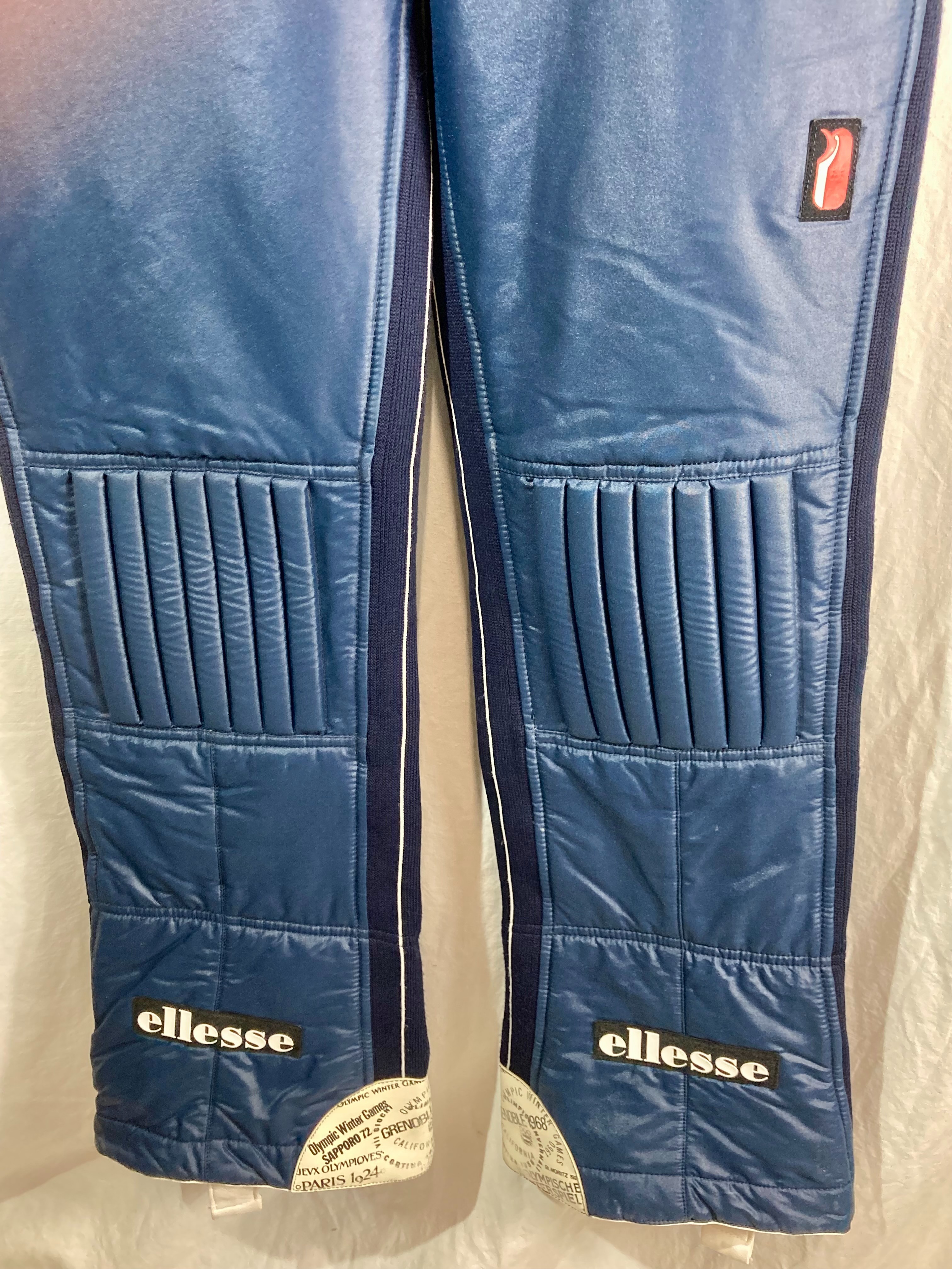 Voir photo 3 de Salopette de Ski Ellesse Vintage – Édition "Olympic Winter Games" T.42 Salopette de Ski Ellesse Vintage – Édition "Olympic Winter Games" T.42 Très bon état reconditionné photo 3
