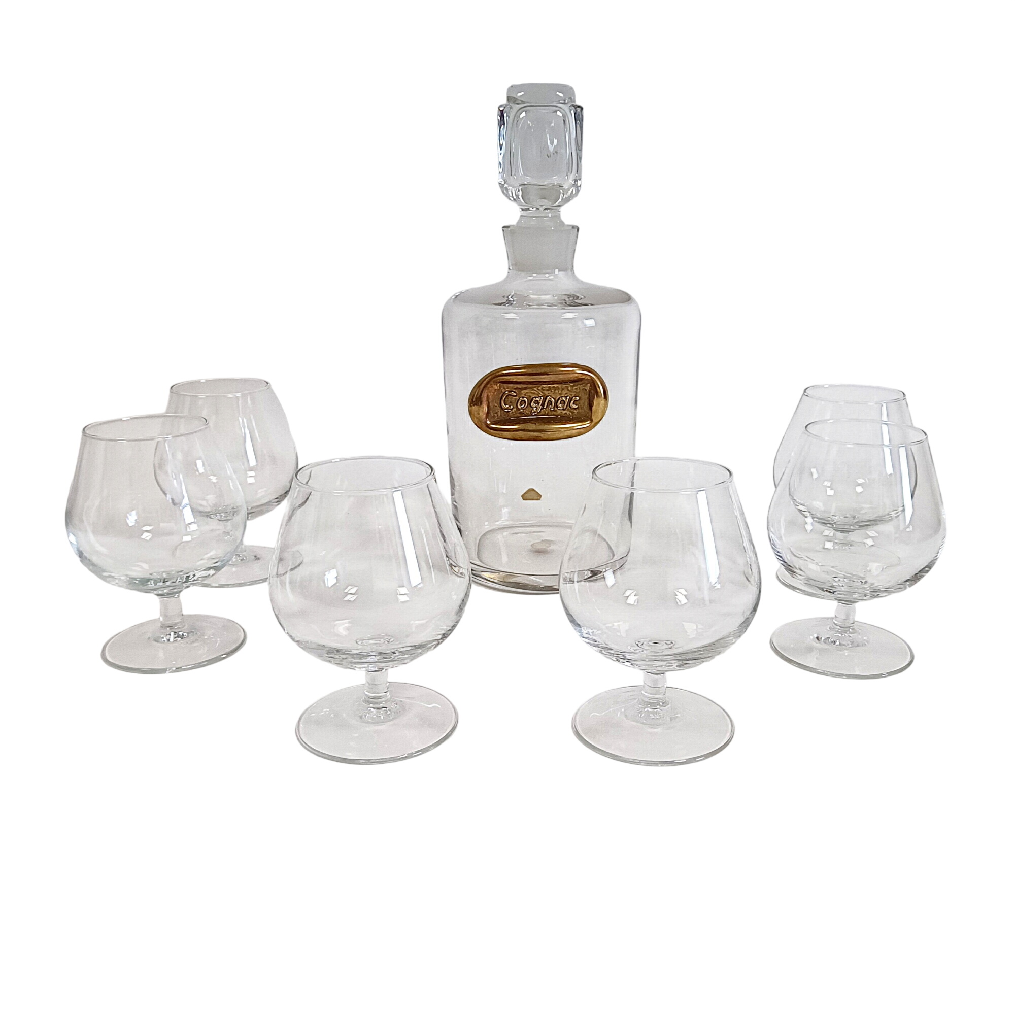 Service à cognac carafe avec son bouchon et 6 verres assortis (made in West Germany) - 39,00 € Service à cognac carafe avec son bouchon et 6 verres assortis (made in West Germany) reconditionné disponible sur Label Emmaüs