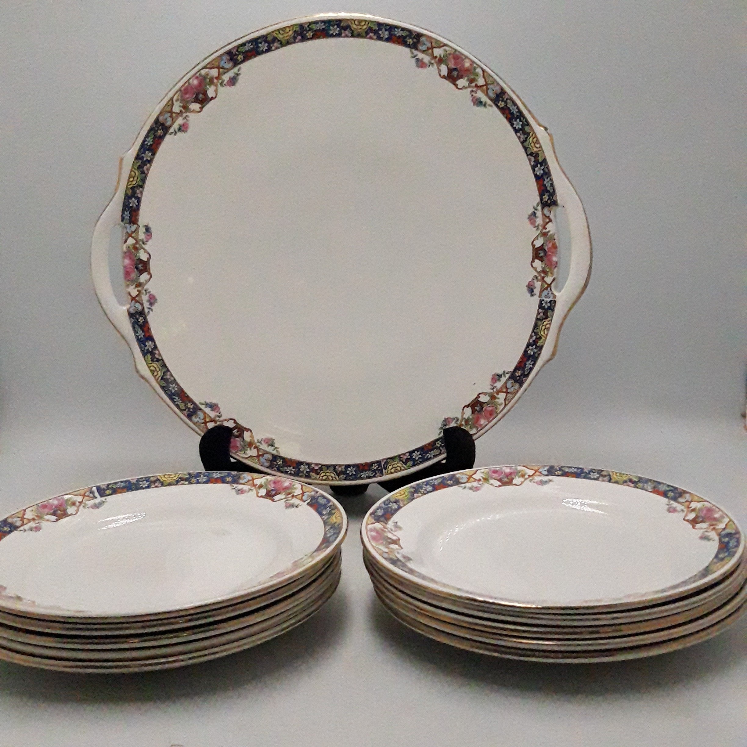 Voir photo 3 de Service à gateau ancien, plat + 10 assiettes Sarreguemines France Service à gateau ancien, plat + 10 assiettes Sarreguemines France Bon état reconditionné photo 3