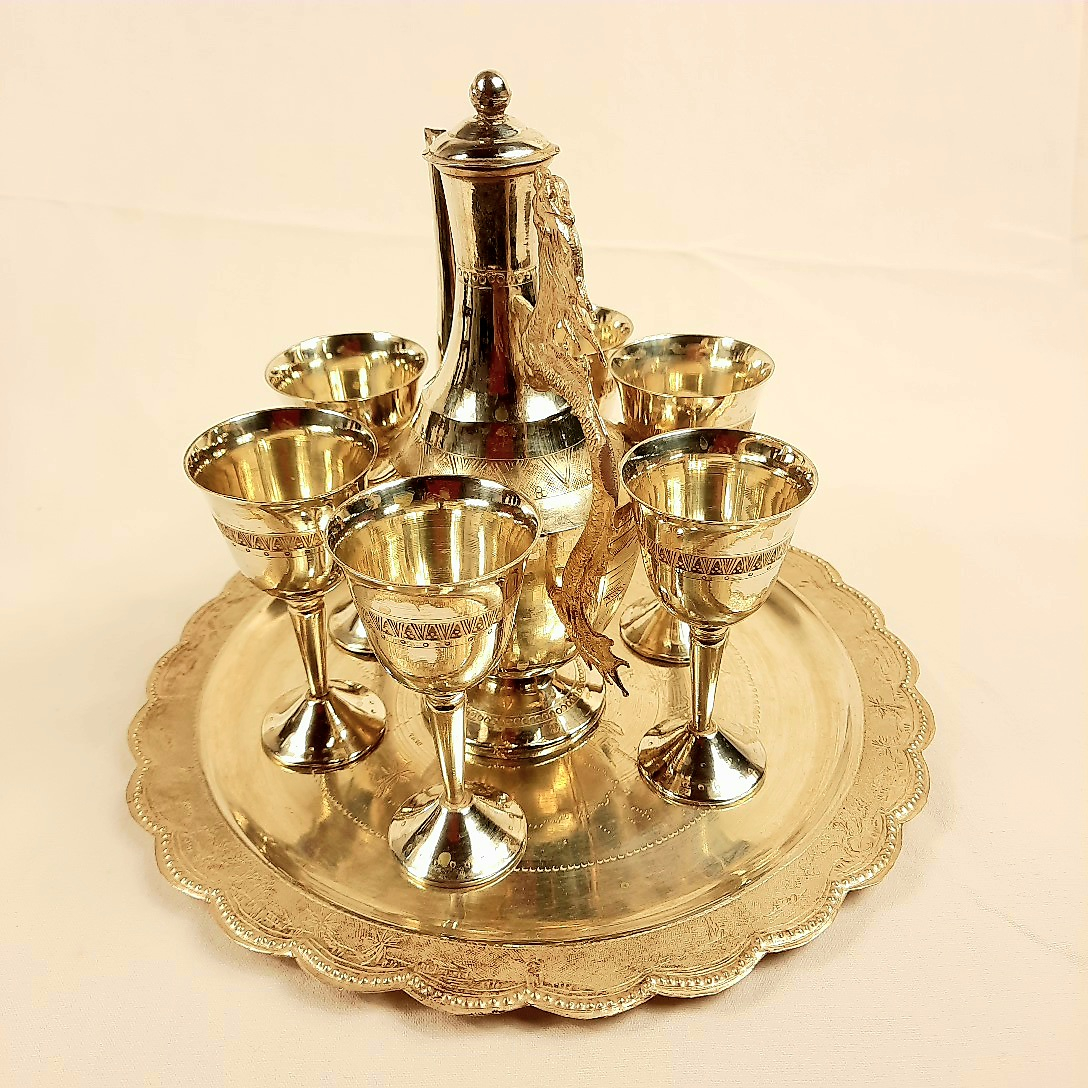 Voir photo 2 de Service à thé marocain sur pied en bois sculpté et vaisselle en métal argenté Service à thé marocain sur pied en bois sculpté et vaisselle en métal argenté Très bon état reconditionné photo 2