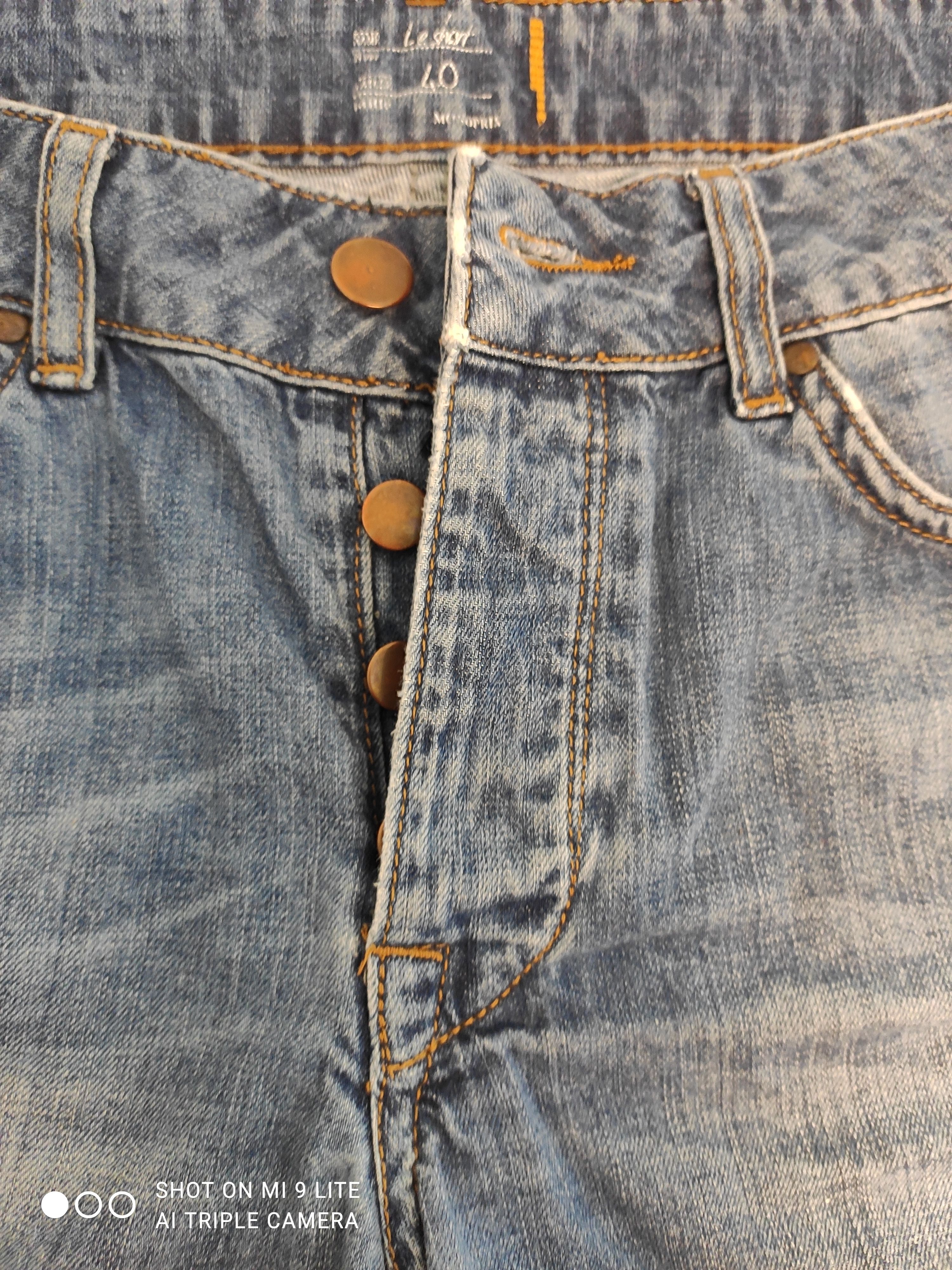Voir photo 3 de Short en jean bleu délavé coupe classique – MONOPRIX – Taille 40 Short en jean bleu délavé coupe classique – MONOPRIX – Taille 40 Très bon état reconditionné photo 3