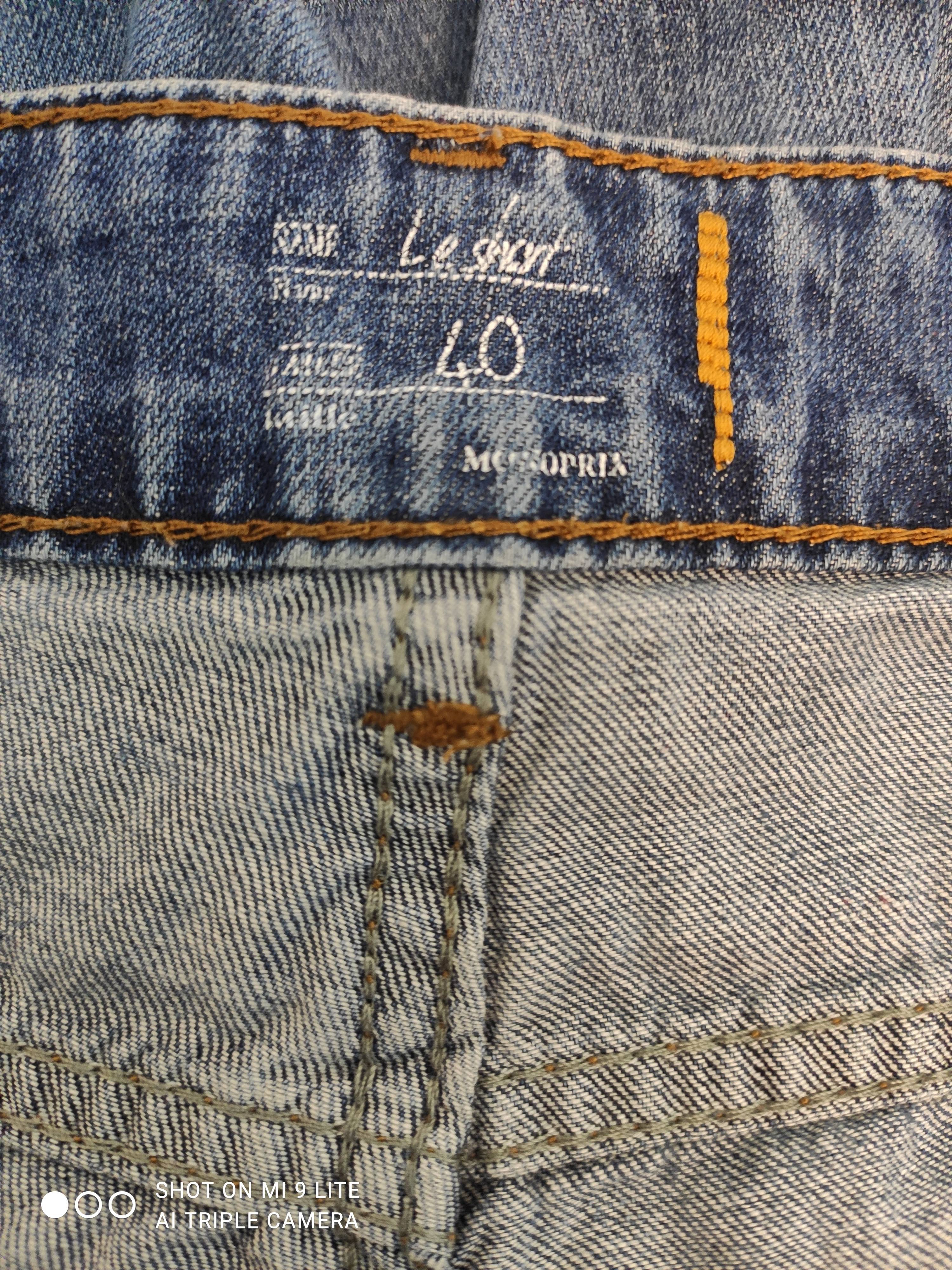 Voir photo 5 de Short en jean bleu délavé coupe classique – MONOPRIX – Taille 40 Short en jean bleu délavé coupe classique – MONOPRIX – Taille 40 Très bon état reconditionné photo 5