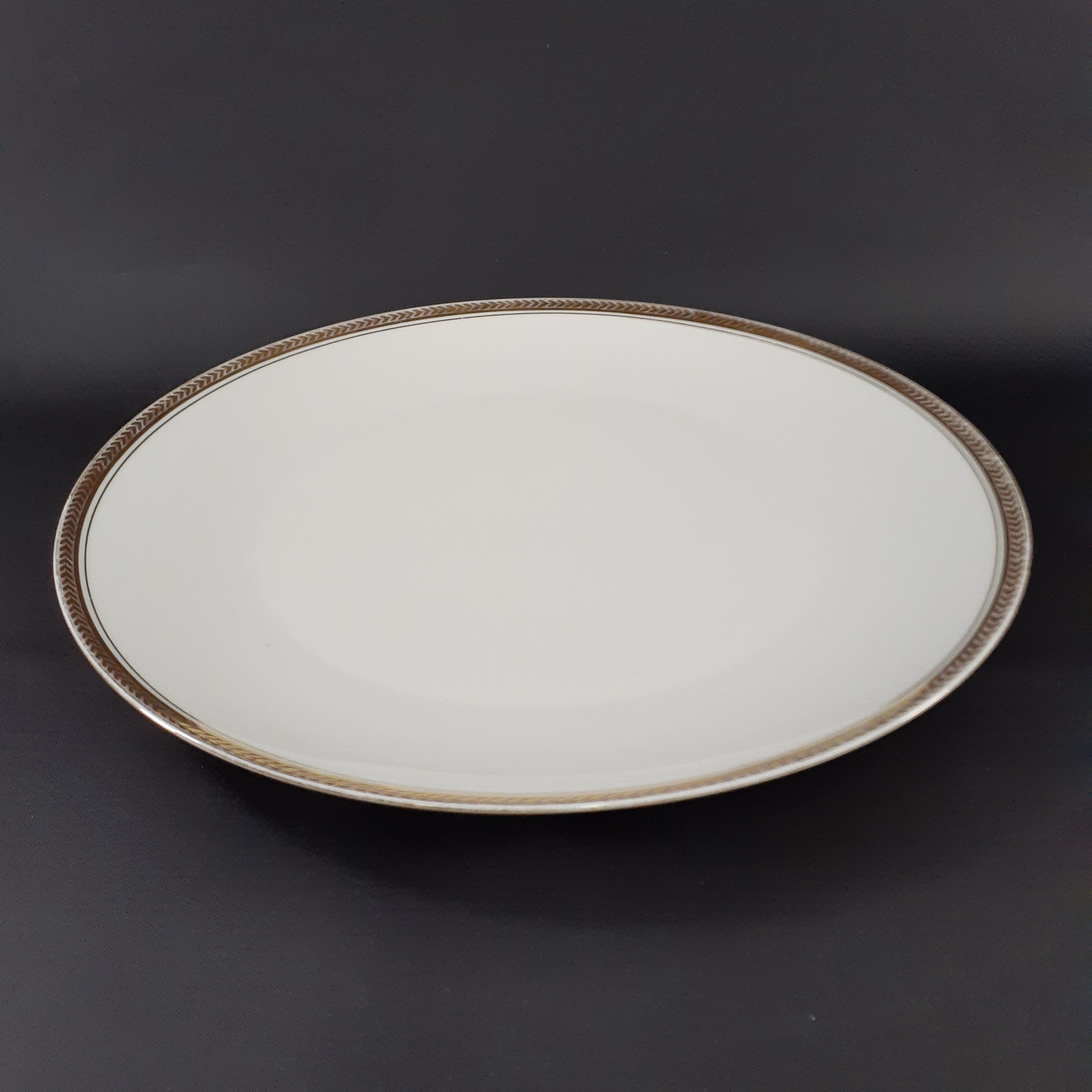 Voir photo 10 de Soupière, saucière et 2 plats ronds – porcelaine de Limoges - Manufacture R. Leclair— Liseré doré Soupière, saucière et 2 plats ronds – porcelaine de Limoges - Manufacture R. Leclair— Liseré doré reconditionné photo 10