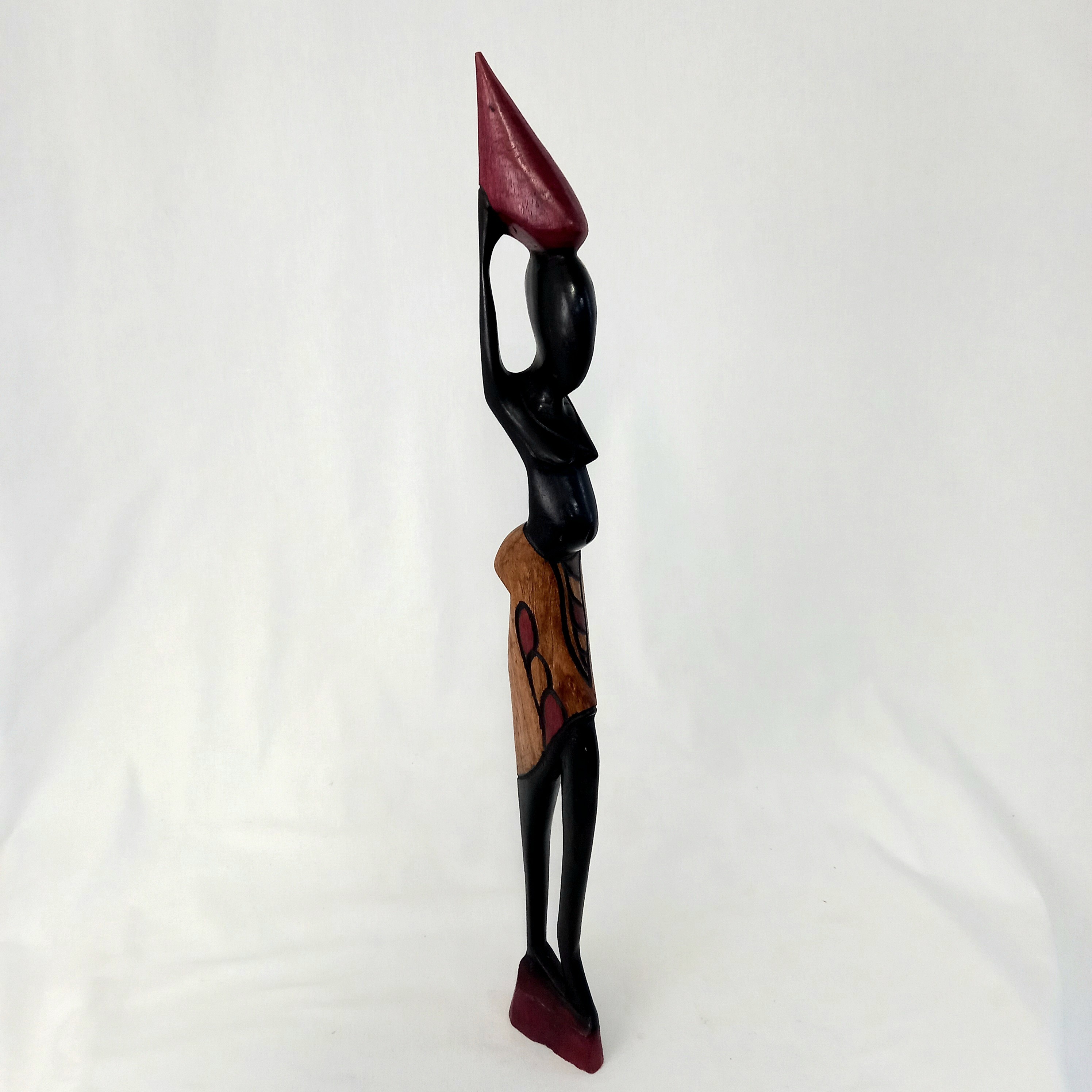 Voir photo 4 de Statuette africaine en bois représentant une femme porteuse d'eau Statuette africaine en bois représentant une femme porteuse d'eau Très bon état reconditionné photo 4