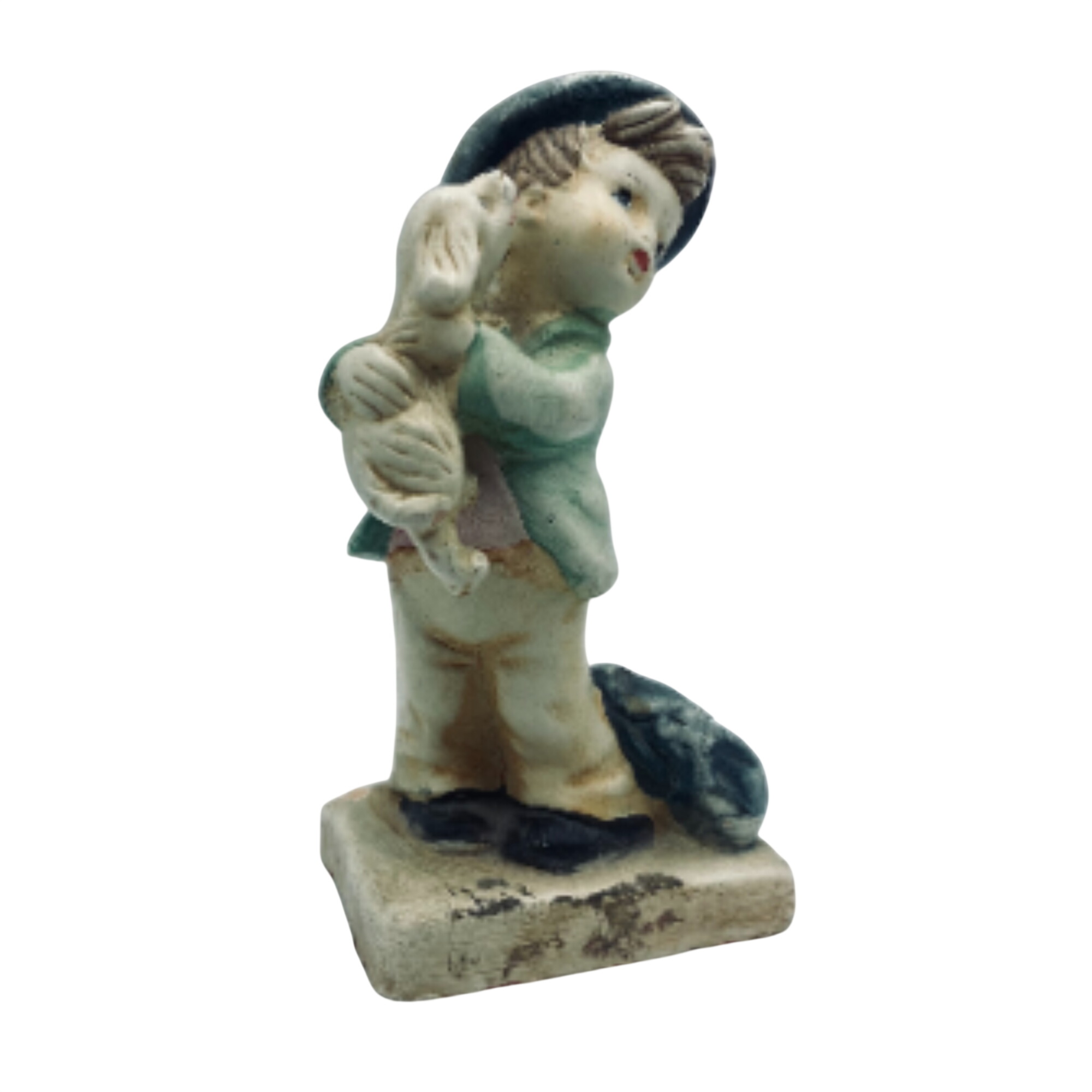 Statuette d'un écolier portant un petit chien État correct - 16,00 € Statuette d'un écolier portant un petit chien État correct reconditionné disponible sur Label Emmaüs