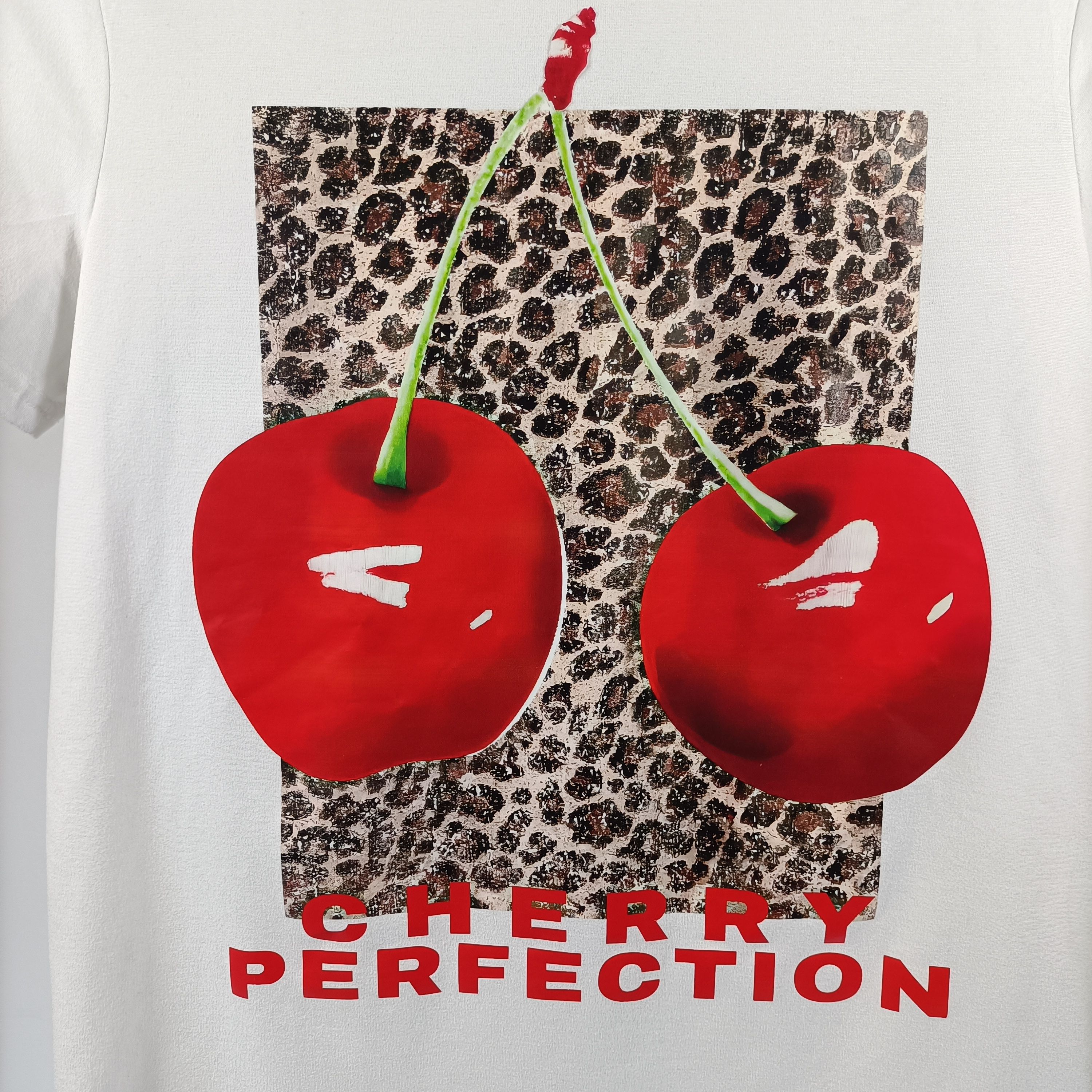 Voir photo 5 de T-shirt blanc cerises imprimé léopard stretch femme XS A3620 T-shirt blanc cerises imprimé léopard stretch femme XS A3620 Très bon état reconditionné photo 5