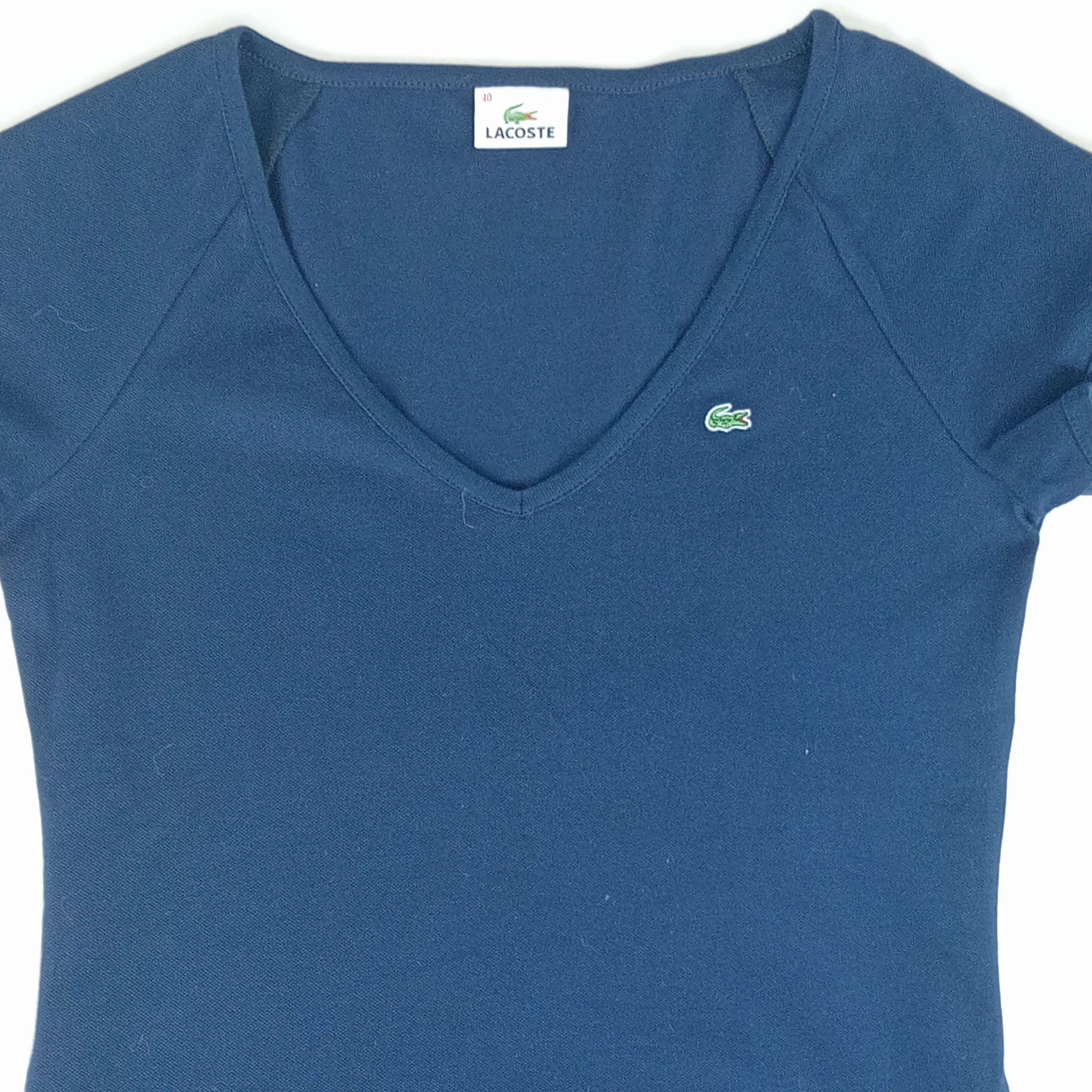 Voir photo 3 de T shirt - femme - marque Lacoste - manches courtes - couleur bleu marine - taille L (40) T shirt - femme - marque Lacoste - manches courtes - couleur bleu marine - taille L (40) Très bon état reconditionné photo 3
