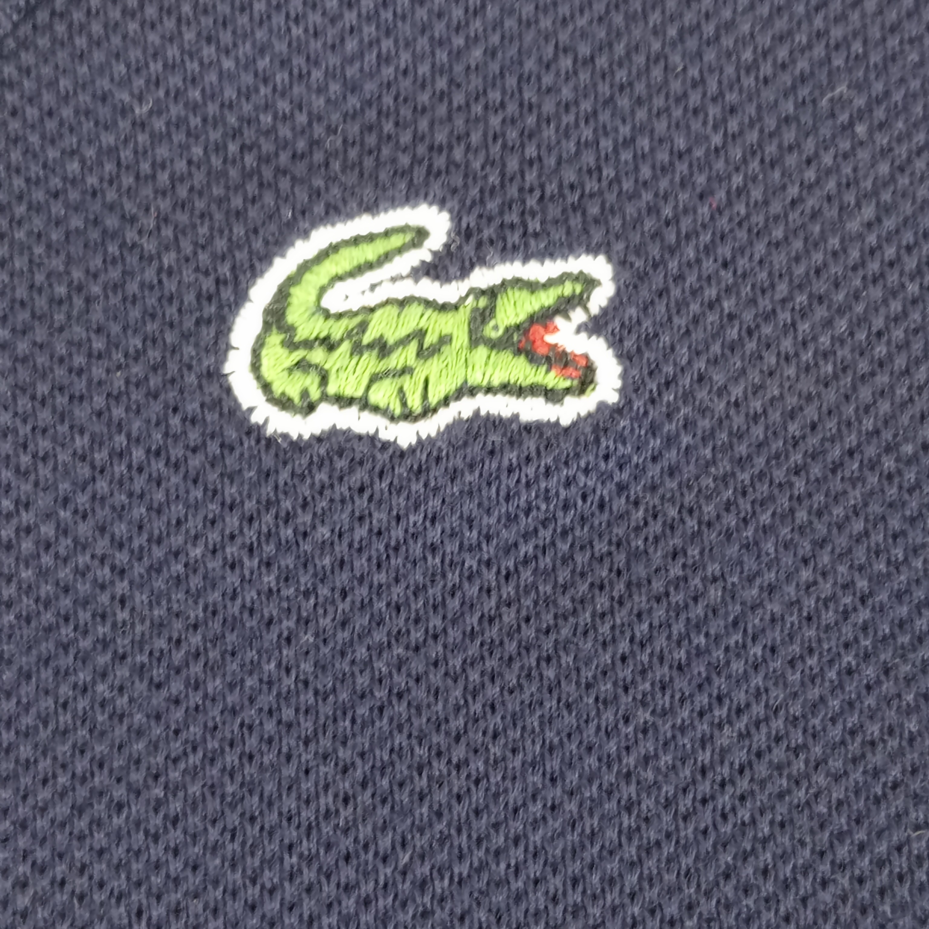 Voir photo 6 de T shirt - femme - marque Lacoste - manches courtes - couleur bleu marine - taille L (40) T shirt - femme - marque Lacoste - manches courtes - couleur bleu marine - taille L (40) Très bon état reconditionné photo 6