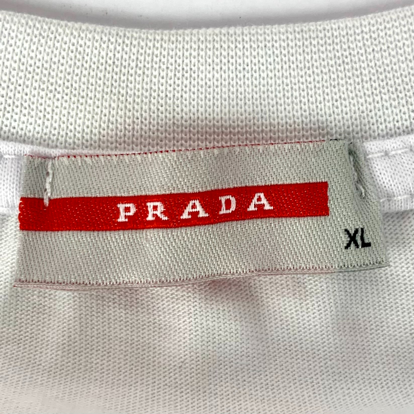 Voir photo 4 de T-Shirt Prada XL T-Shirt Prada XL Très bon état reconditionné photo 4