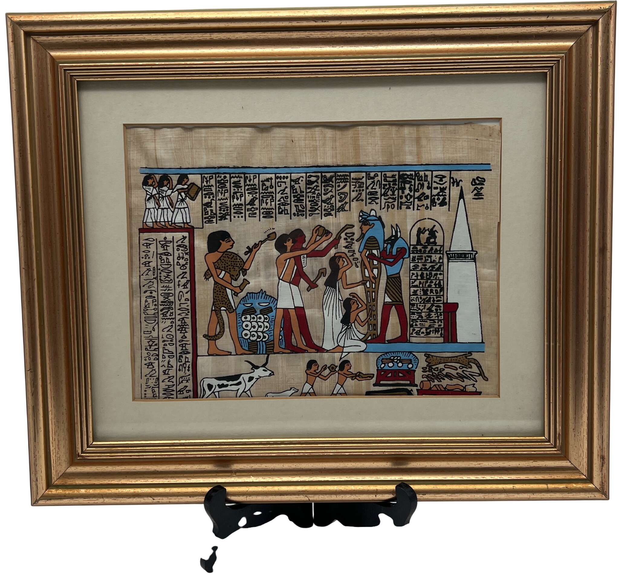 Tableau parchemin égyptien en papyrus cadre plastique doré. Scène d'offrandes. Très bon état - 14,65 € Tableau parchemin égyptien en papyrus cadre plastique doré. Scène d'offrandes. Très bon état reconditionné disponible sur Label Emmaüs