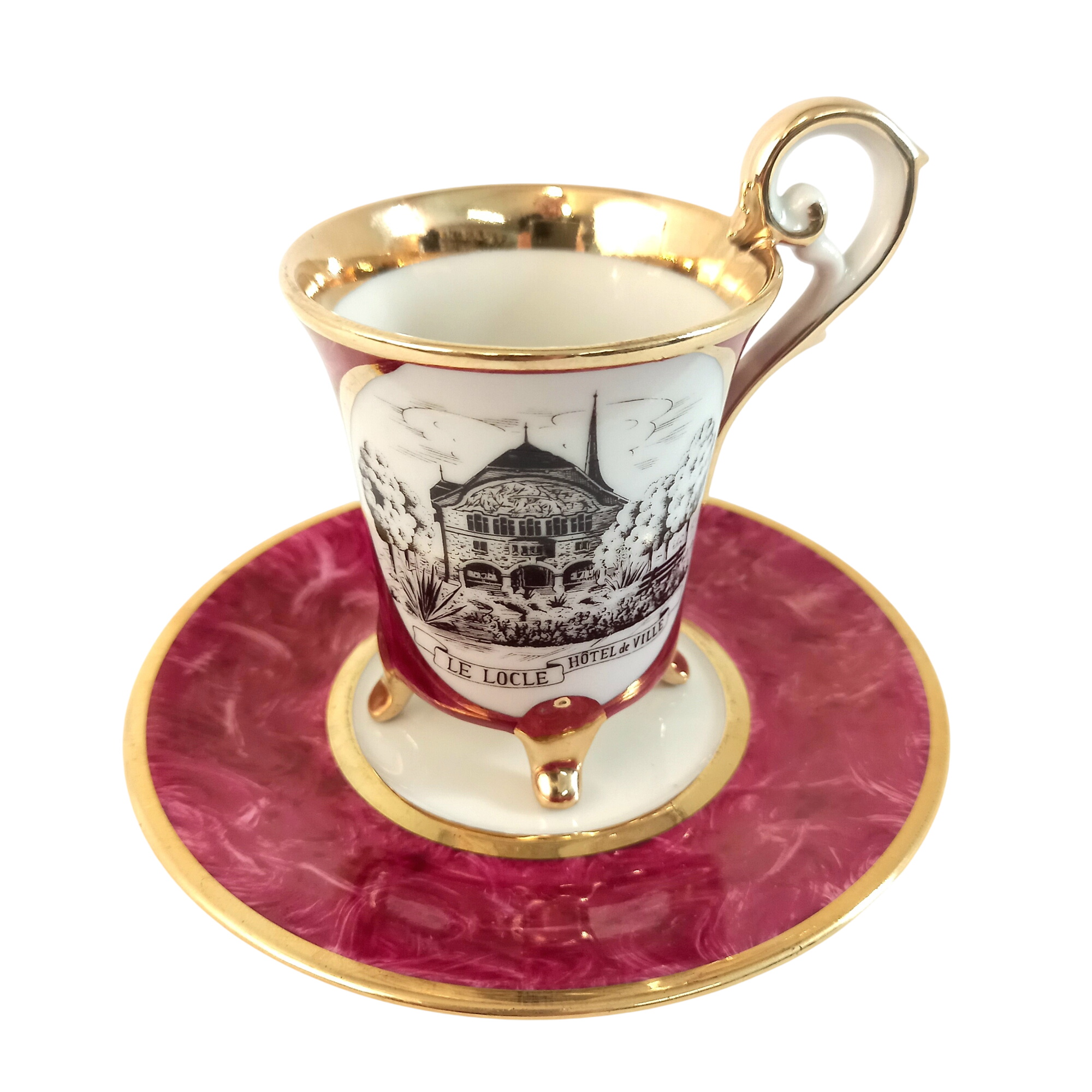 Tasse à café sur pied et sous-tasse en porcelaine, Ottlinger Sevelen, représentant l'hôtel de Ville du Locle - 12,00 € Tasse à café sur pied et sous-tasse en porcelaine, Ottlinger Sevelen, représentant l'hôtel de Ville du Locle reconditionné disponible sur Label Emmaüs