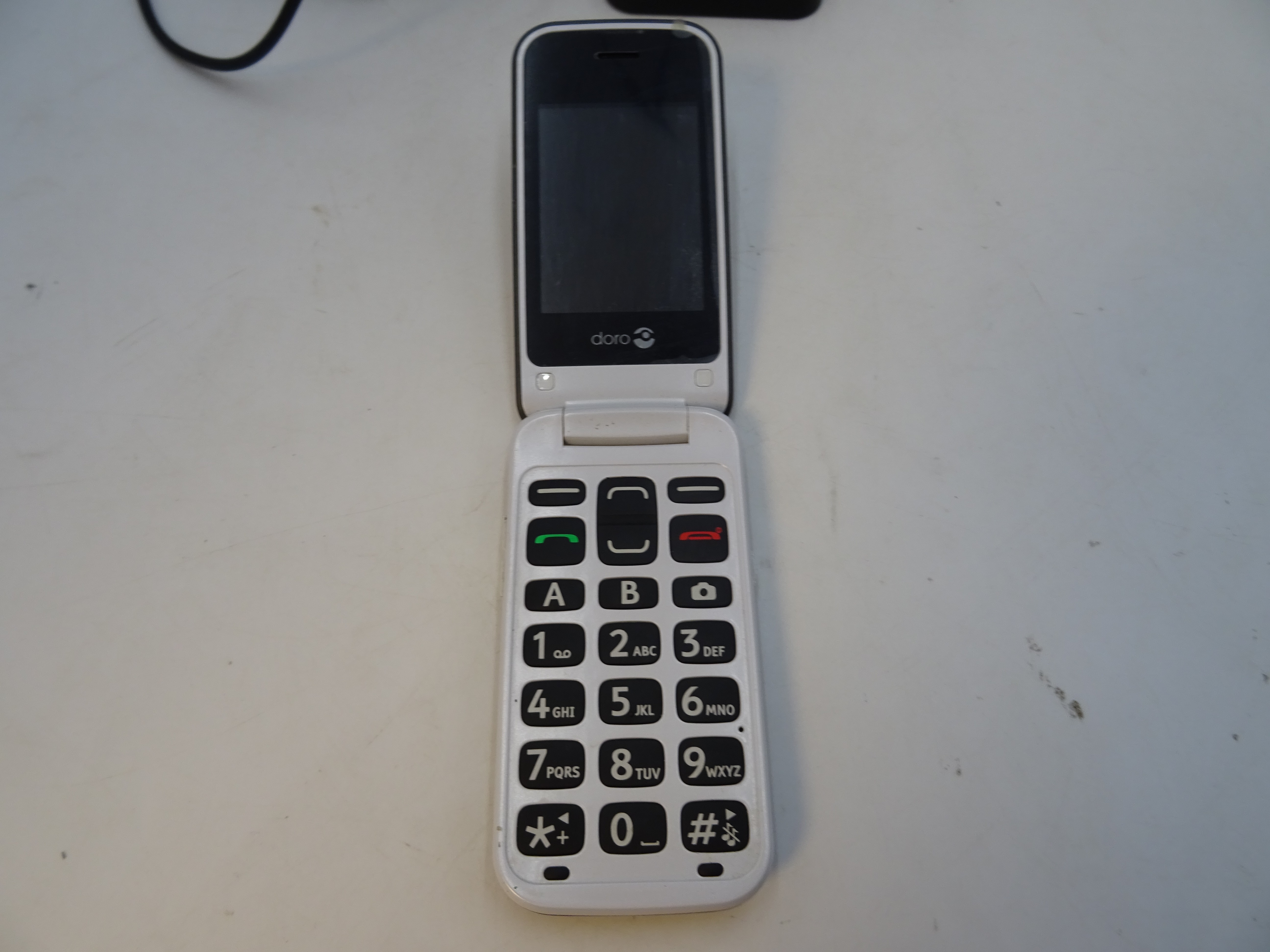 Voir photo 4 de Téléphone portable DORO 2424. Téléphone portable DORO 2424. Bon état reconditionné photo 4