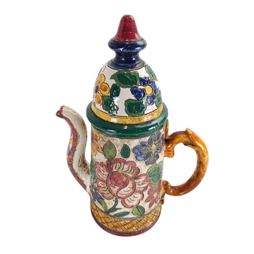 Théière ou cafetière en terre cuite avec décor émaillé Bon état - 30,00 € Théière ou cafetière en terre cuite avec décor émaillé Bon état reconditionné disponible sur Label Emmaüs