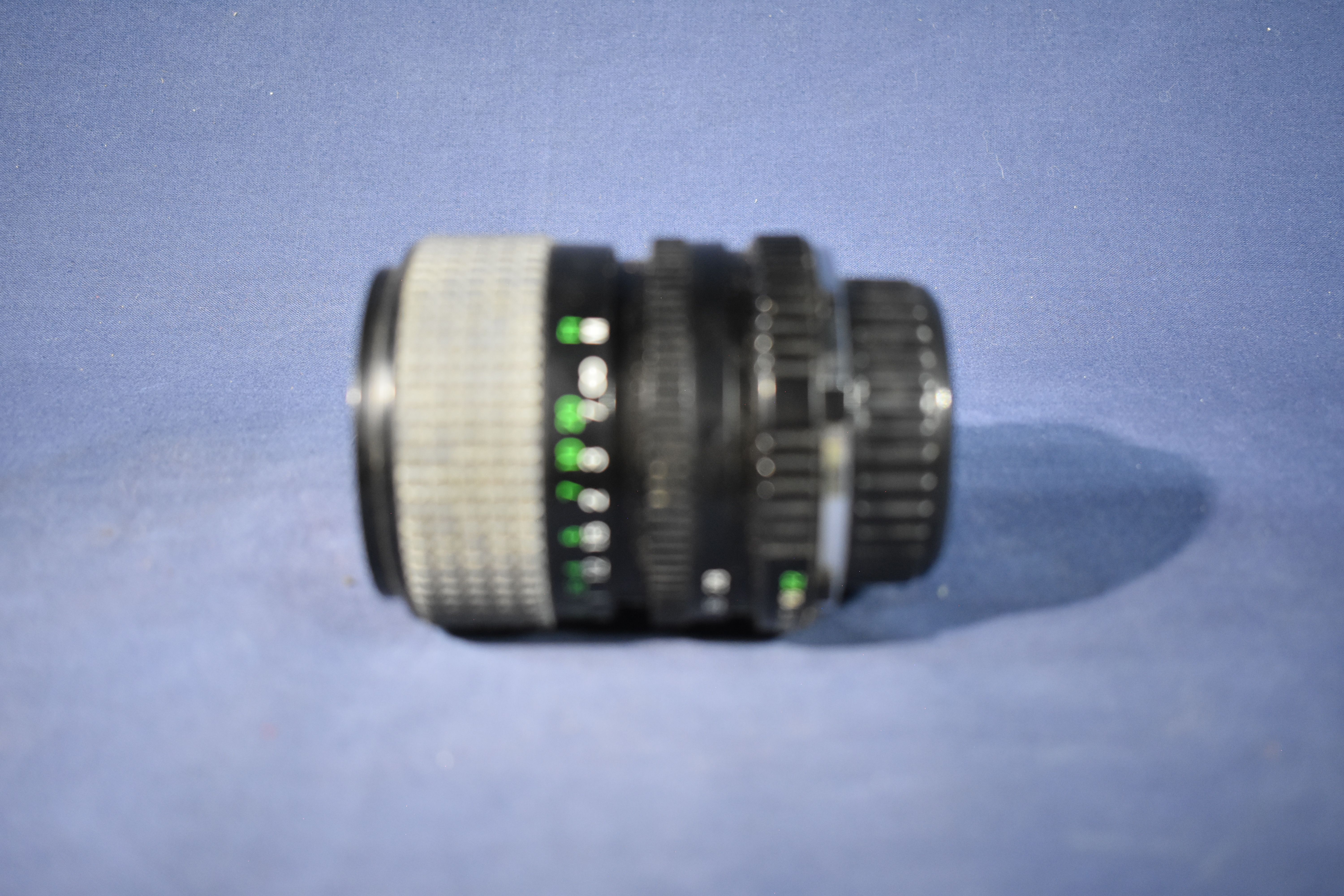 Voir photo 8 de Trois objectifs : COSINA 70/210 - MINOLTA 35/70 - FUJICA 50mm Trois objectifs : COSINA 70/210 - MINOLTA 35/70 - FUJICA 50mm Bon état reconditionné photo 8