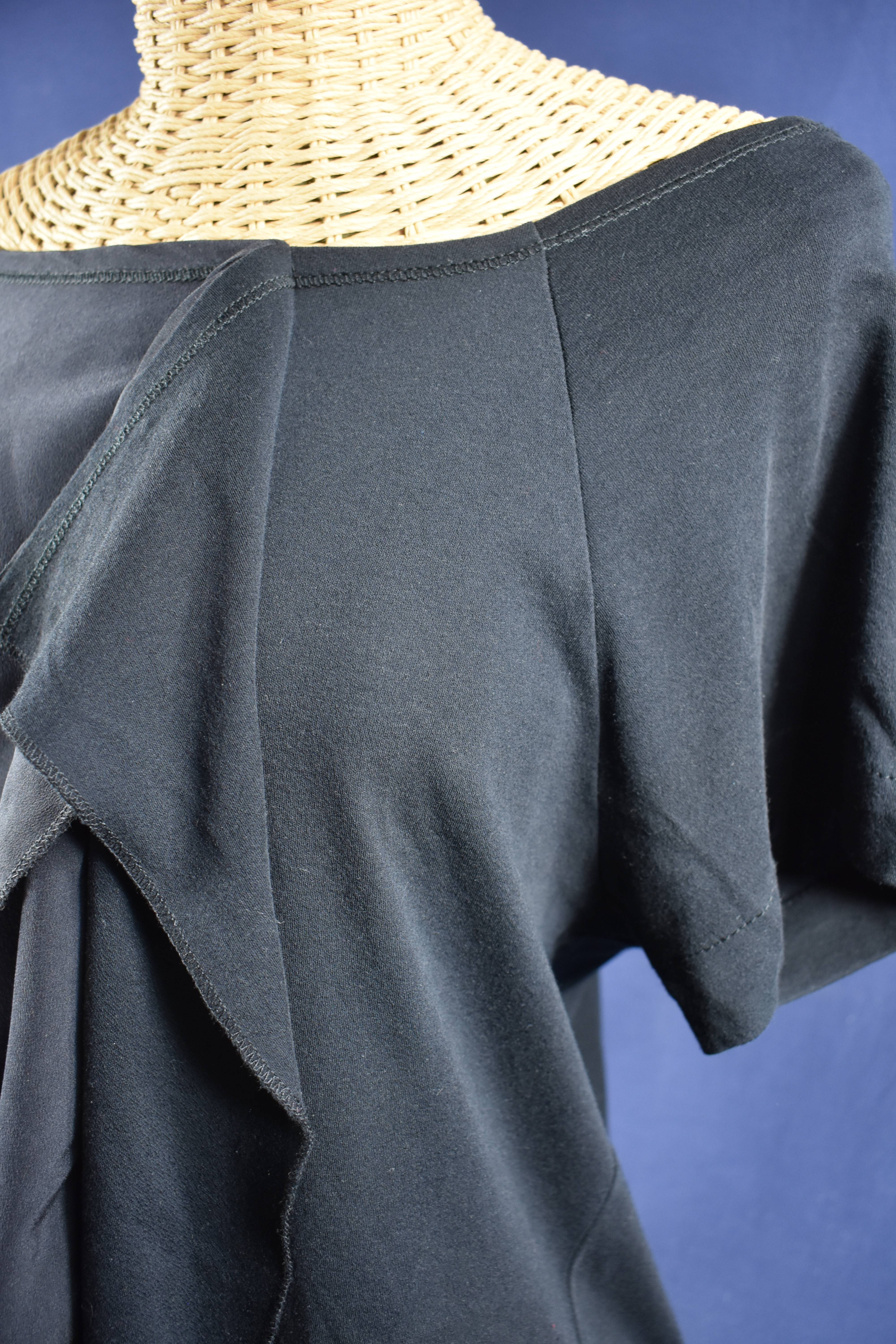 Voir photo 3 de Tunique en Jersey et mousseline noire taille 44 signée SONIA RYKIEL. Tunique en Jersey et mousseline noire taille 44 signée SONIA RYKIEL. Bon état reconditionné photo 3