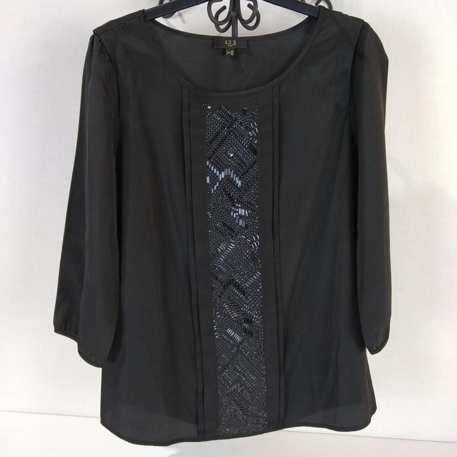 Tunique noire manches 3/4 - 1-2-3 taille 38 Bon état - 16,00 € Tunique noire manches 3/4 - 1-2-3 taille 38 Bon état reconditionné disponible sur Label Emmaüs