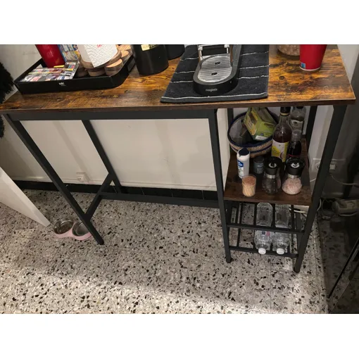 VASAGLE Table Haute, Table à Manger, Table de Bar avec Supports pour Verres et Bouteilles, pour Salon, Cuisine, 110 x 40 x 90 cm, Style Industriel Marron Rustique et Noir LBT013B01 Bon état reconditionné disponible sur Rakuten