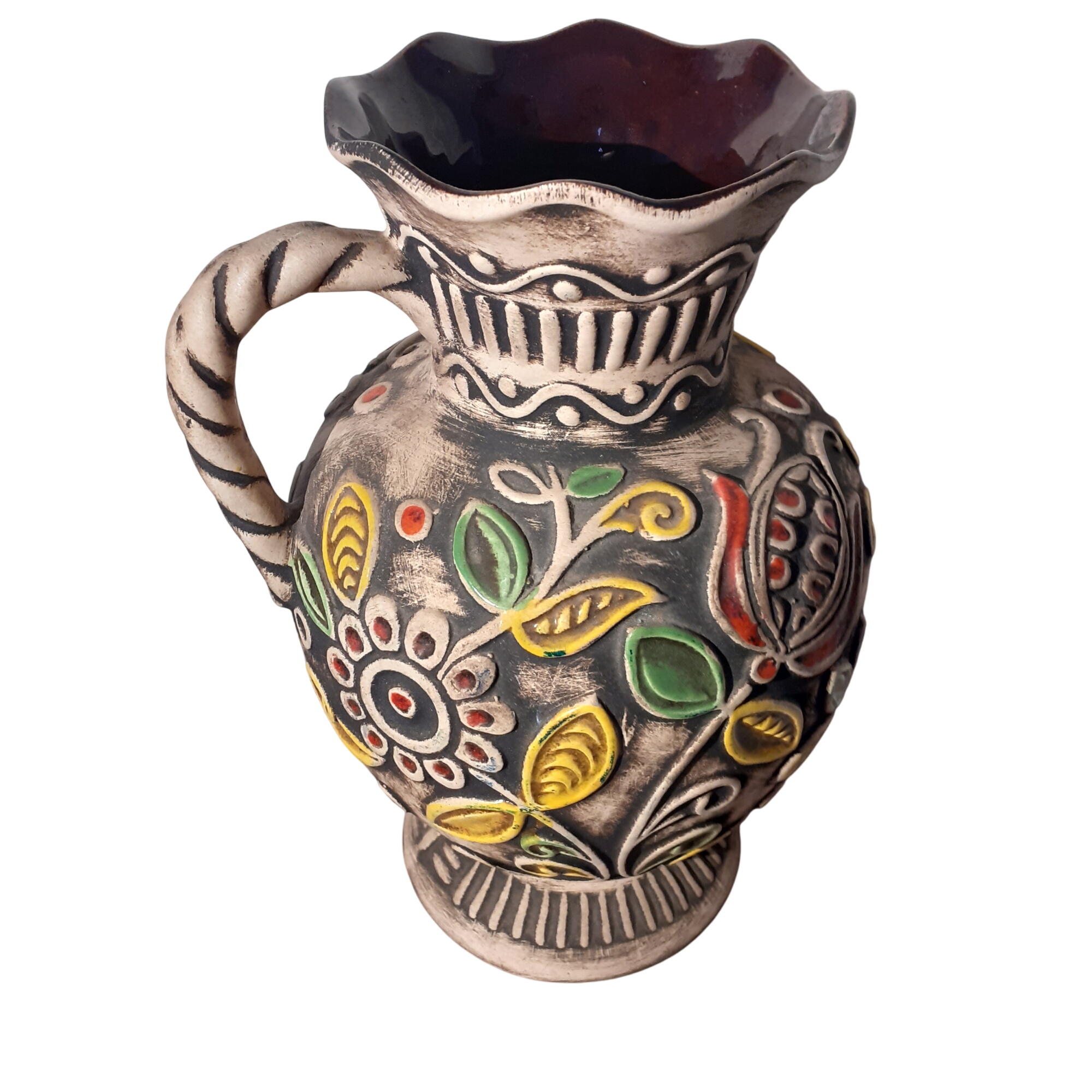 Vase à anse vintage a décor stylisé de fleurs BAY (W-'GERMANY) Très bon état - 16,00 € Vase à anse vintage a décor stylisé de fleurs BAY (W-'GERMANY) Très bon état reconditionné disponible sur Label Emmaüs