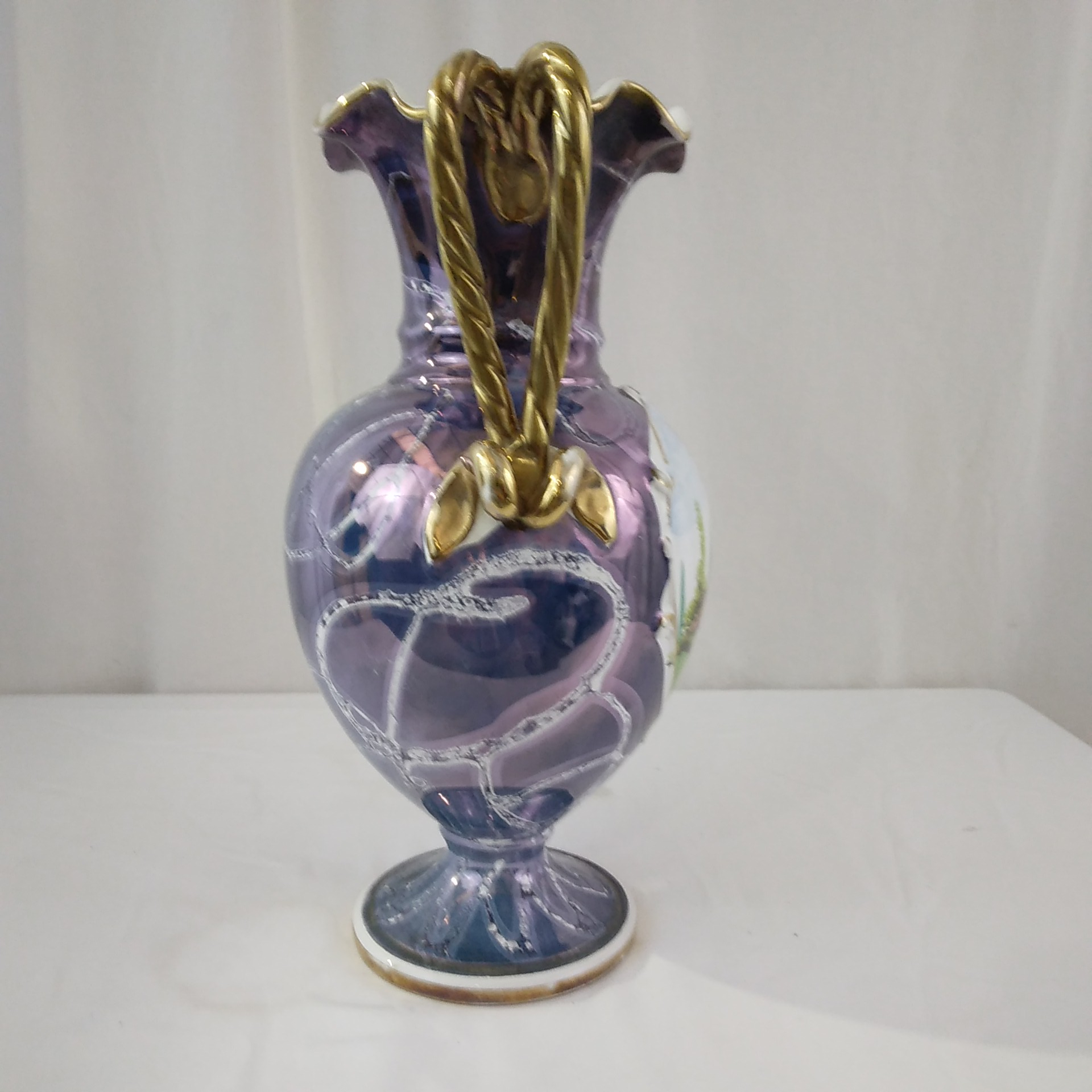 Voir photo 2 de Vase en céramique bleu reflet mauve. Vase en céramique bleu reflet mauve. Très bon état reconditionné photo 2