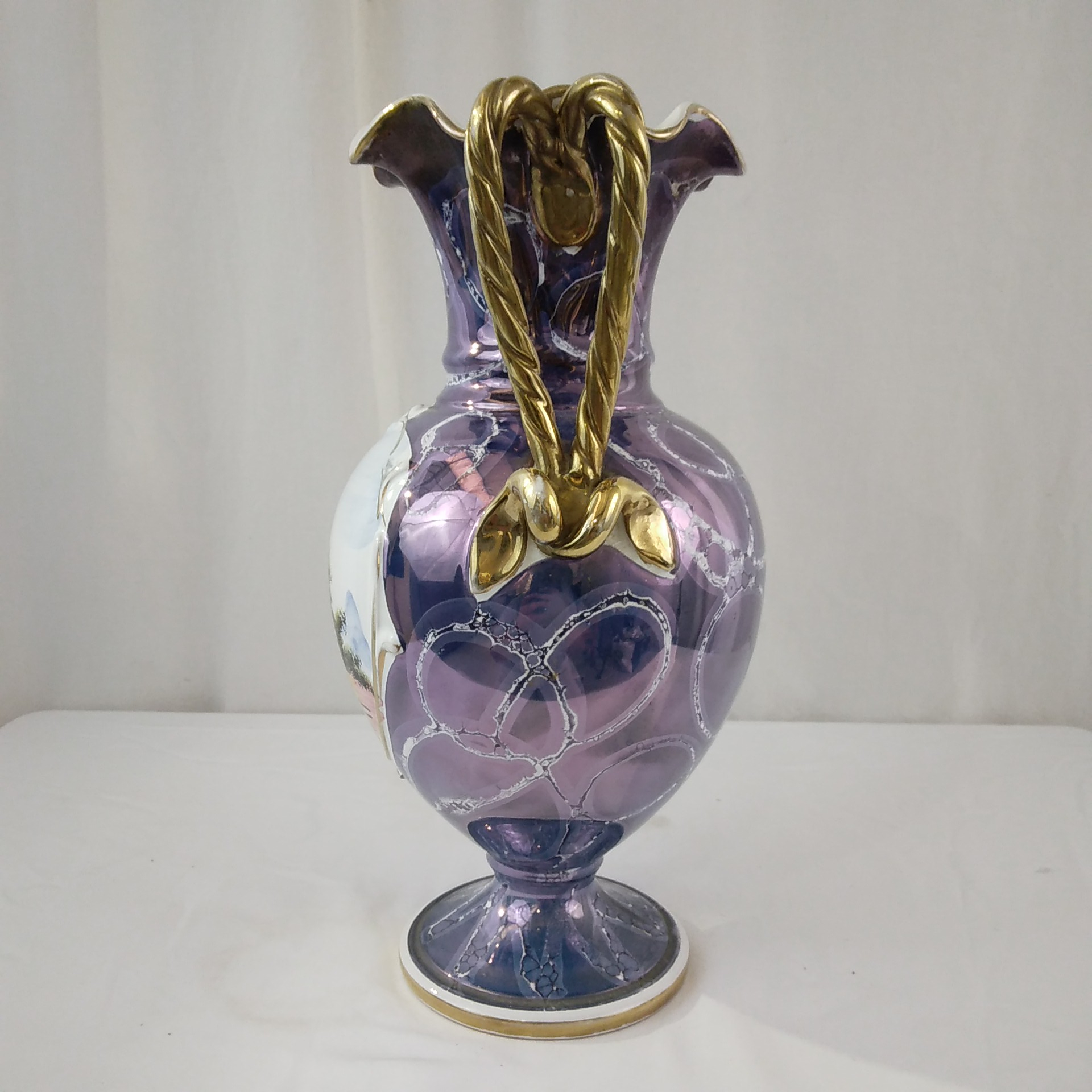 Voir photo 4 de Vase en céramique bleu reflet mauve. Vase en céramique bleu reflet mauve. Très bon état reconditionné photo 4