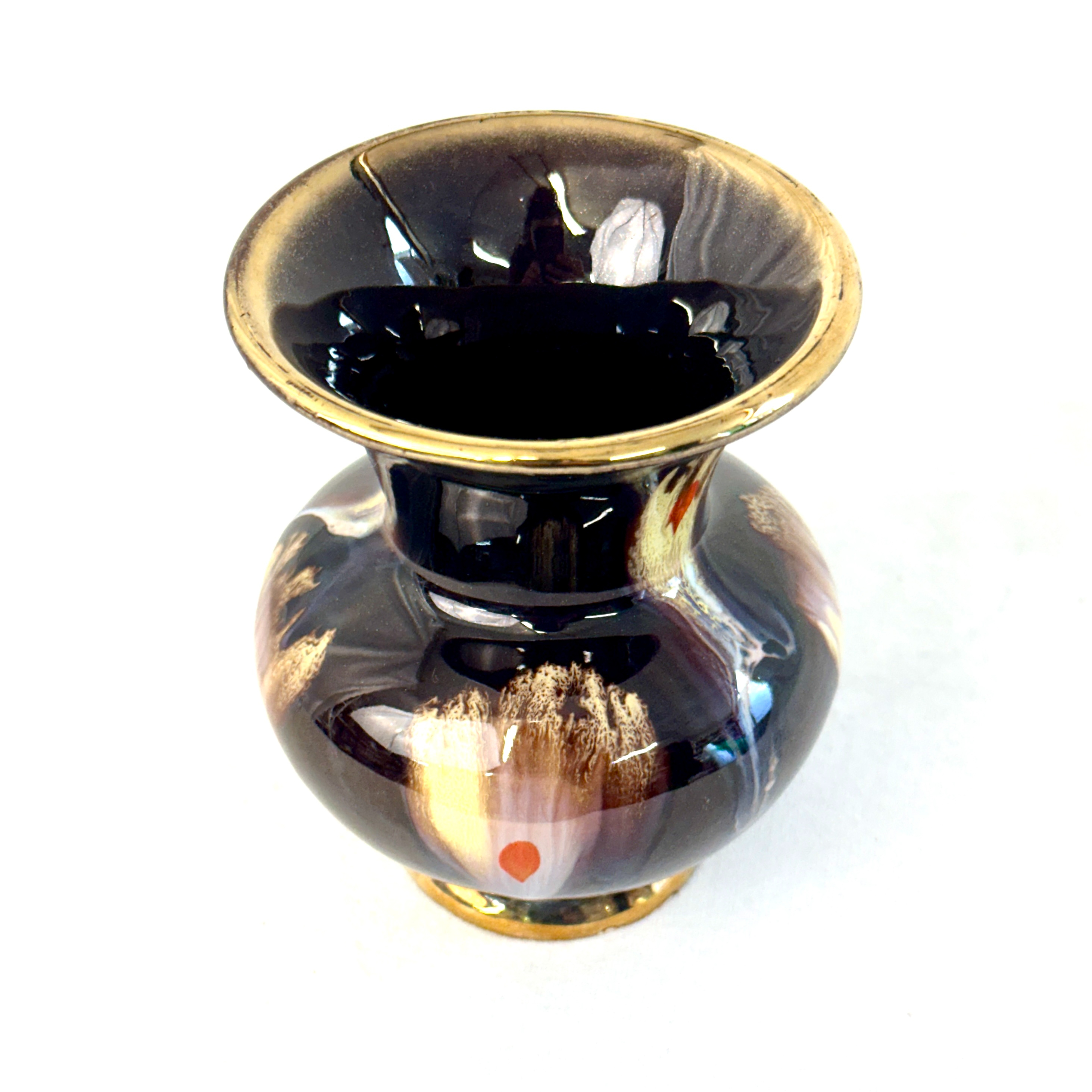 Vase vintage en céramique décor abstrait Germany Bon état - 15,20 € Vase vintage en céramique décor abstrait Germany Bon état reconditionné disponible sur Label Emmaüs