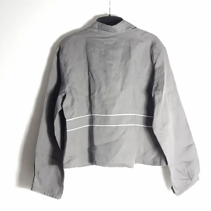 Voir photo 2 de Veste légère femme Chanon - taille T5 Veste légère femme Chanon - taille T5 Parfait état reconditionné photo 2