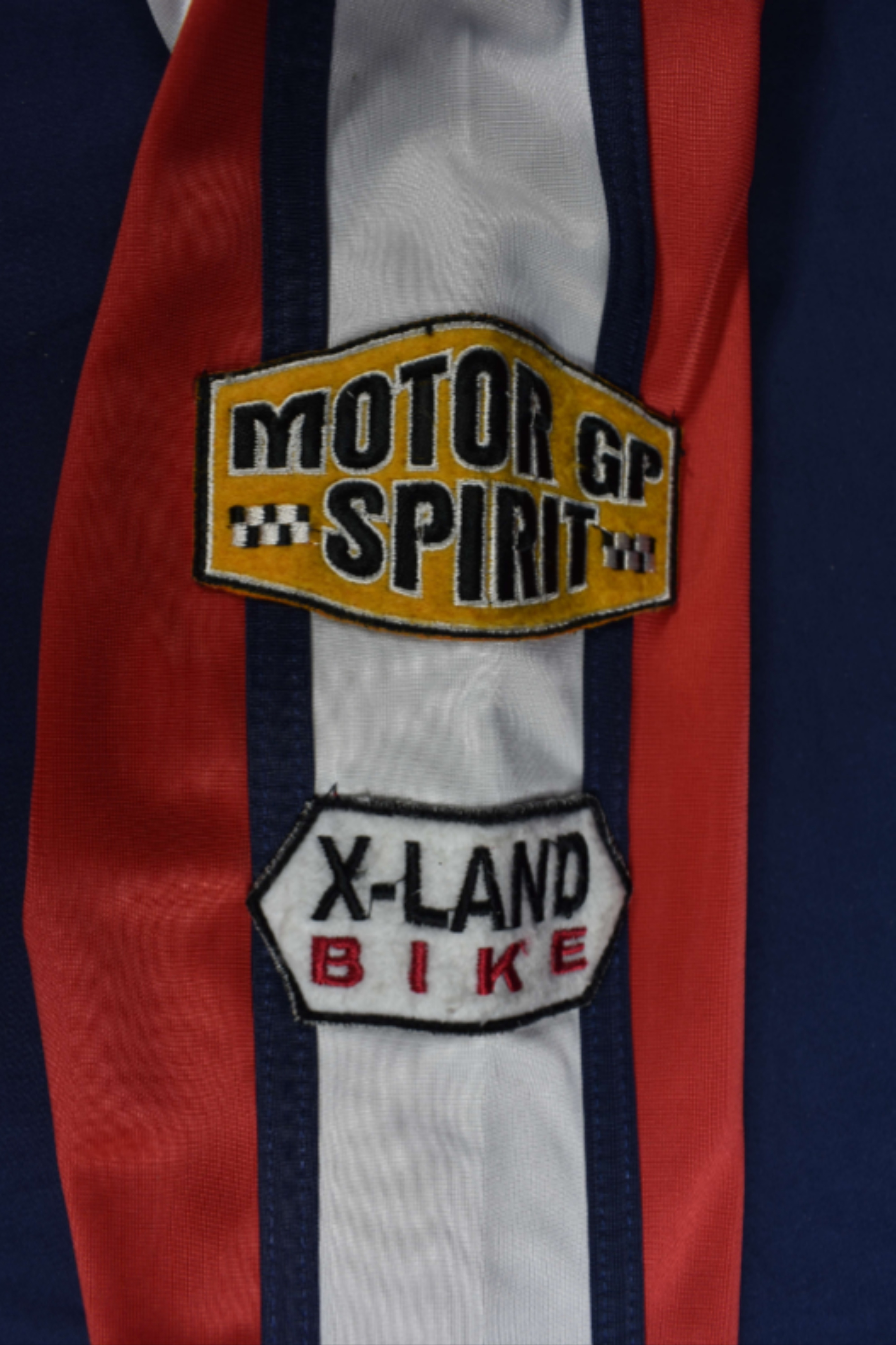 Voir photo 4 de Veste moto " vintage " rouge " X - Land ", polyester taille 5. Veste moto " vintage " rouge " X - Land ", polyester taille 5. Bon état reconditionné photo 4