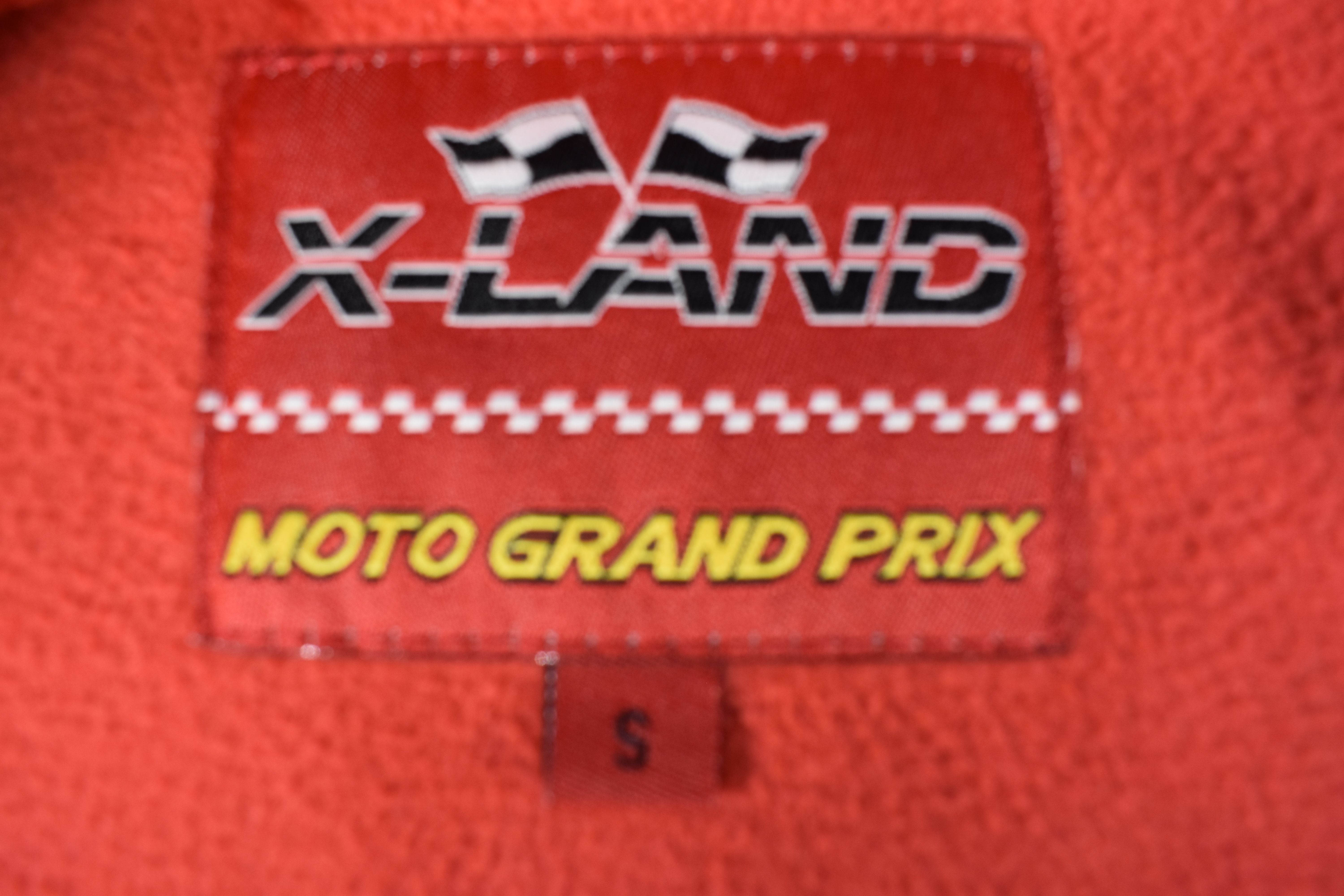 Voir photo 5 de Veste moto " vintage " rouge " X - Land ", polyester taille 5. Veste moto " vintage " rouge " X - Land ", polyester taille 5. Bon état reconditionné photo 5