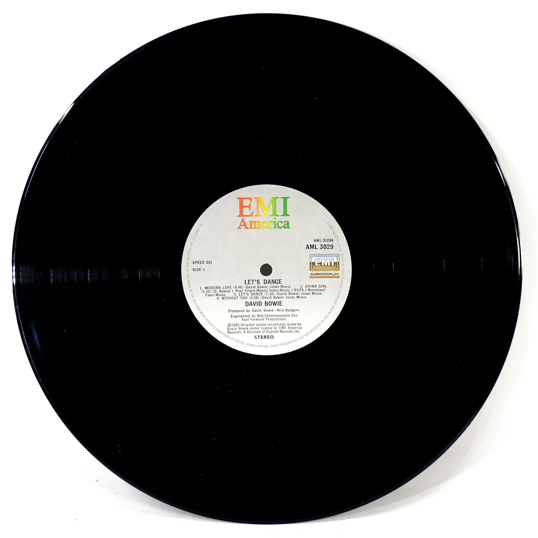 Voir photo 2 de Vinyle - David Bowie - Let's Dance Vinyle - David Bowie - Let's Dance Bon état reconditionné photo 2