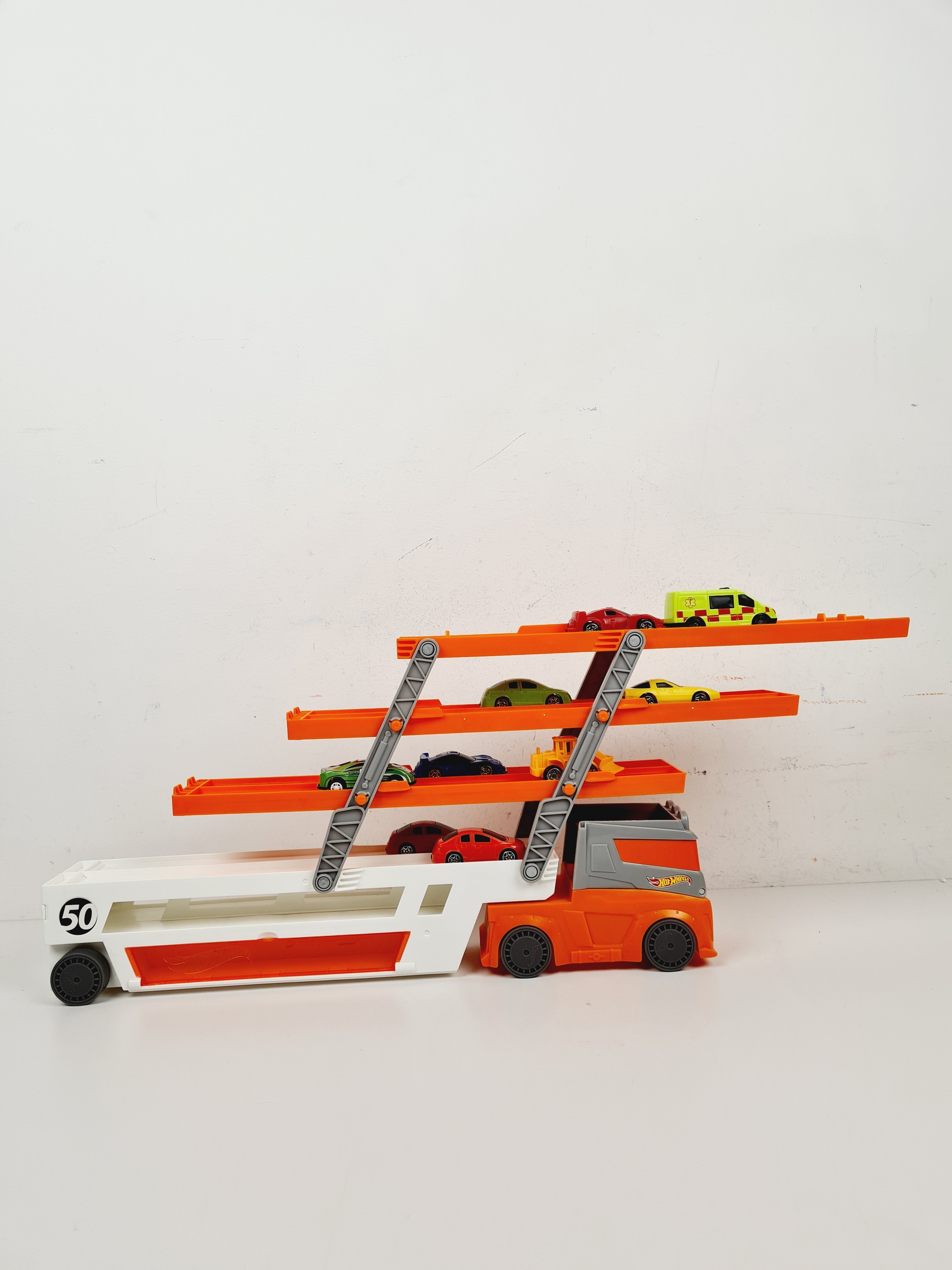 Voir photo 4 de Voiture - Camion Méga Transporteur, avec lot de 10 petites voitures - Hot wheels - 45 cm Voiture - Camion Méga Transporteur, avec lot de 10 petites voitures - Hot wheels - 45 cm Bon état reconditionné photo 4