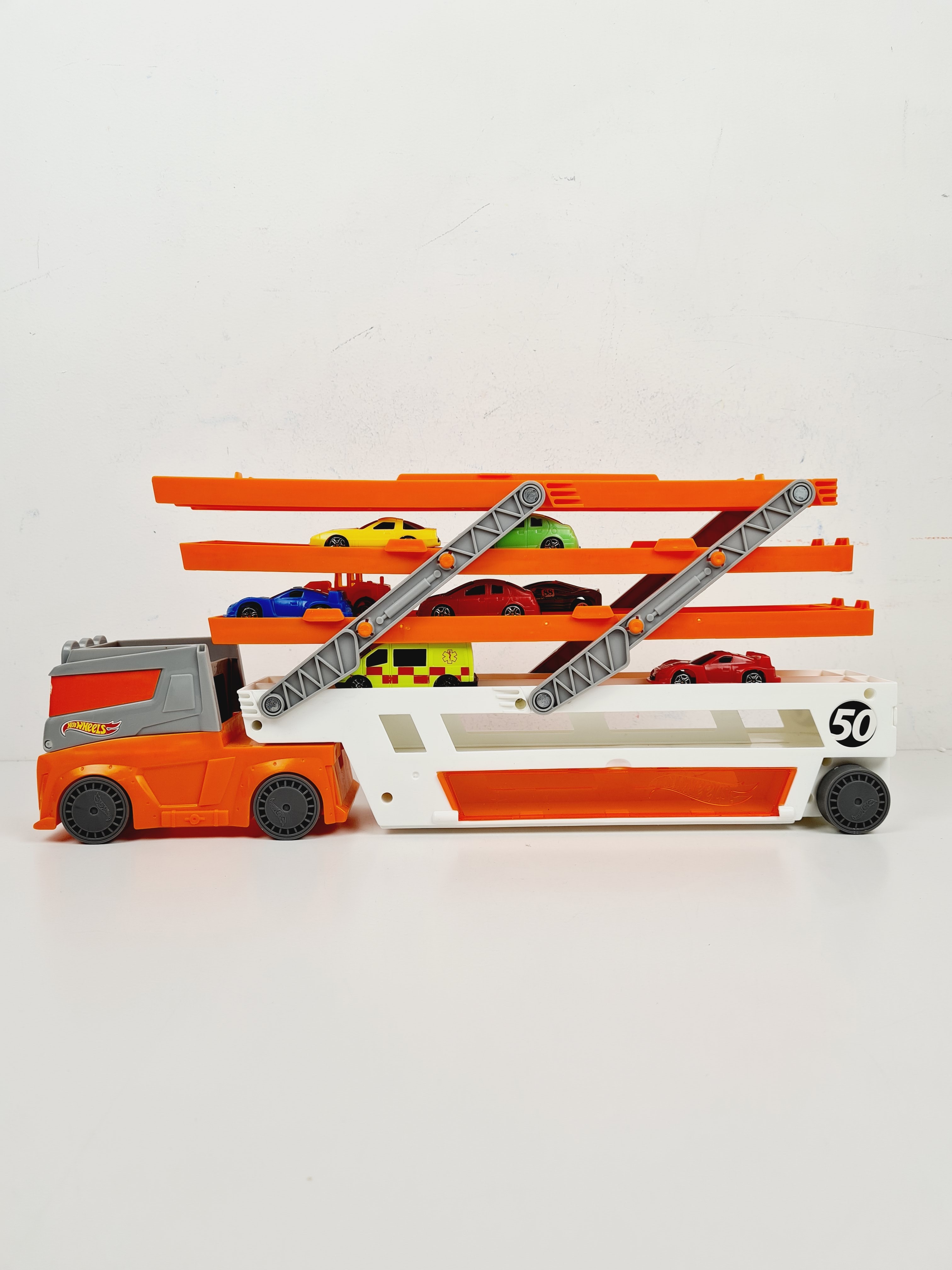 Voir photo 6 de Voiture - Camion Méga Transporteur, avec lot de 10 petites voitures - Hot wheels - 45 cm Voiture - Camion Méga Transporteur, avec lot de 10 petites voitures - Hot wheels - 45 cm Bon état reconditionné photo 6